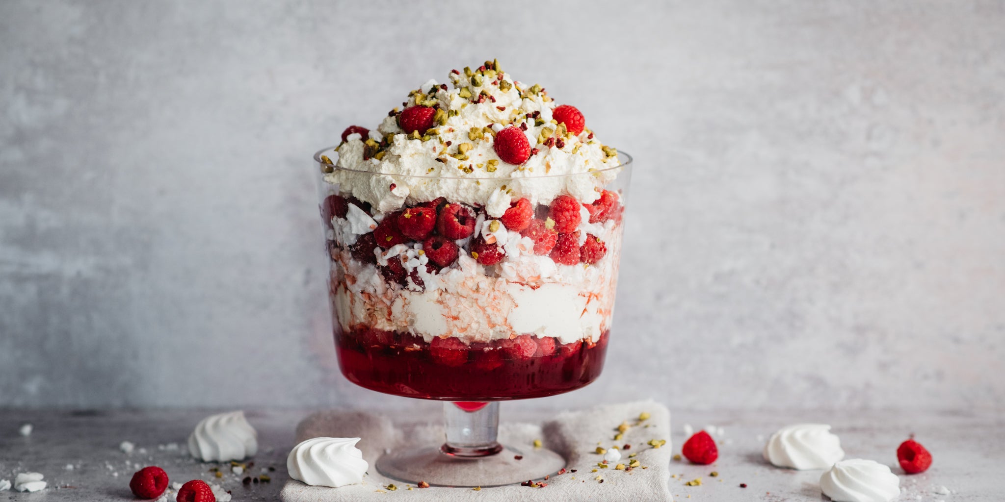 Eton Mess Trifle topped with meringue and fresh raspberries