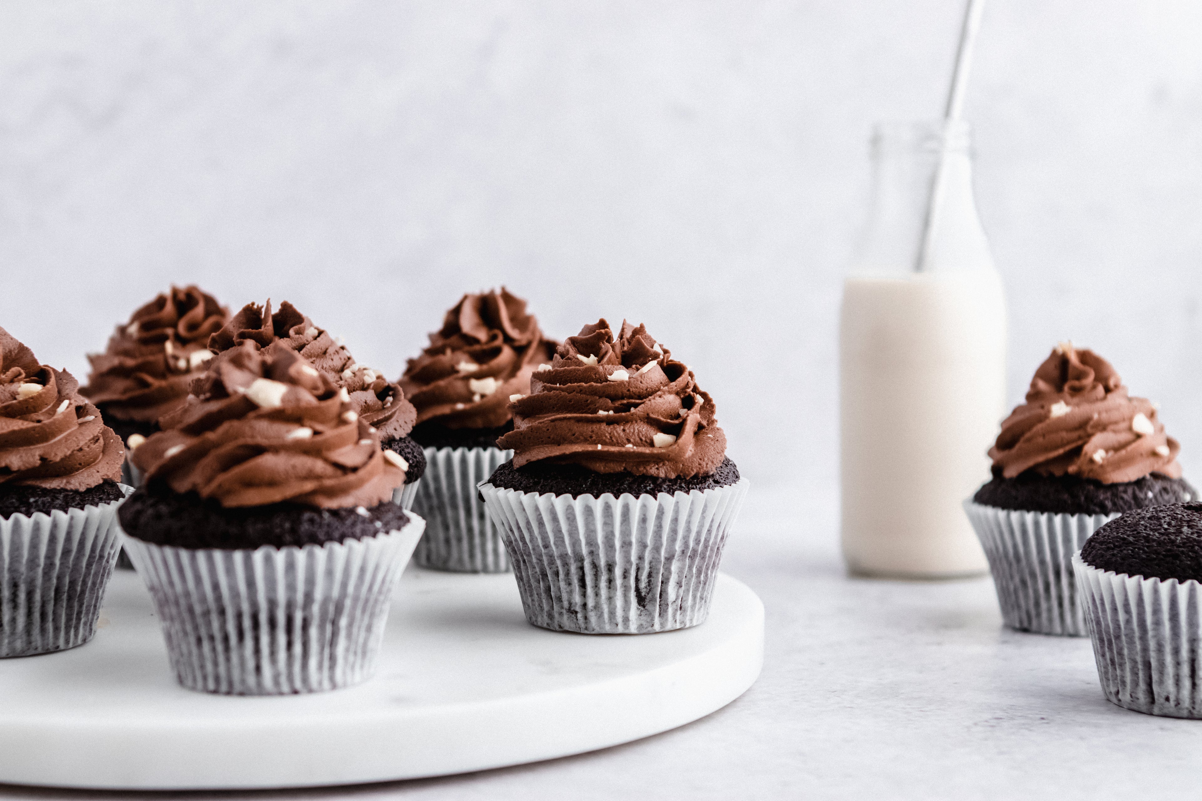 Nutella Cupcakes with glass bottle of milk in the background