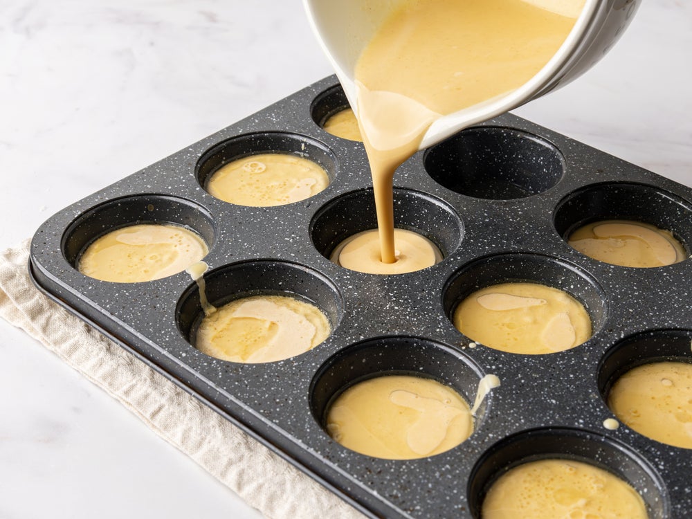 Yorkshire pudding batter poured into tin