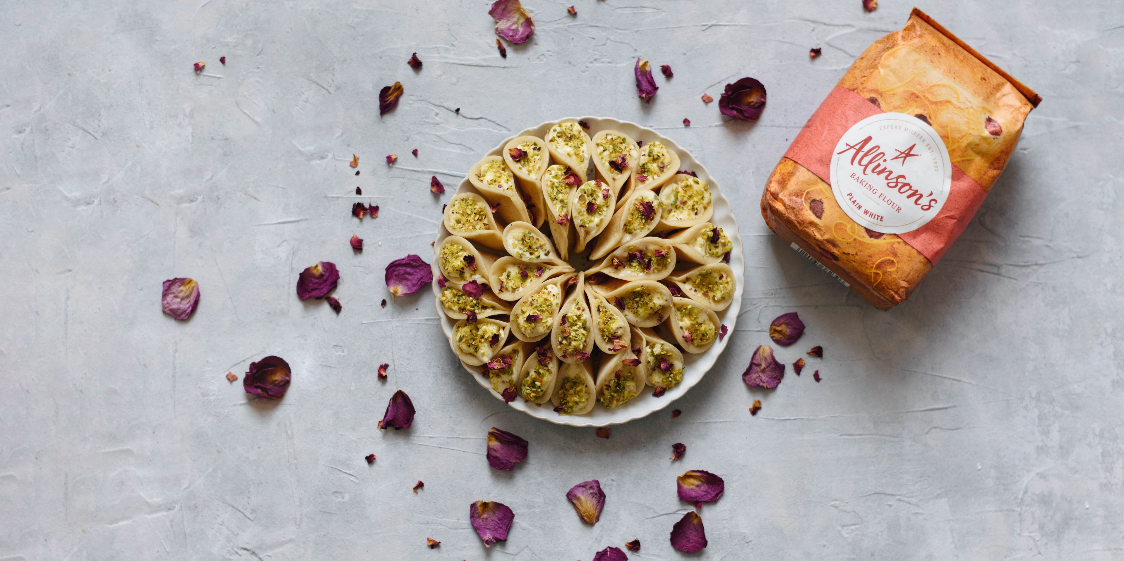 Qatayef on a plate decorated with petals