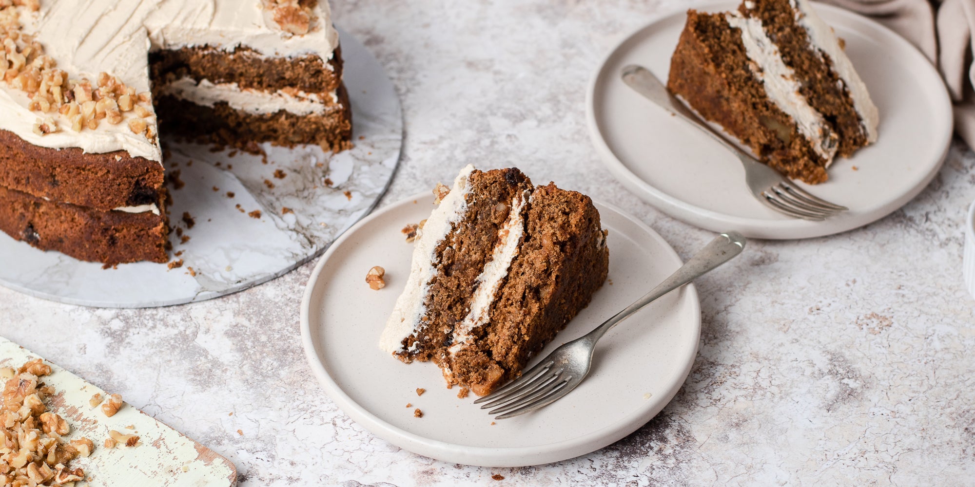 A slice of Gluten Free Vegan Coffee Cake served on a plate, next to a fork.