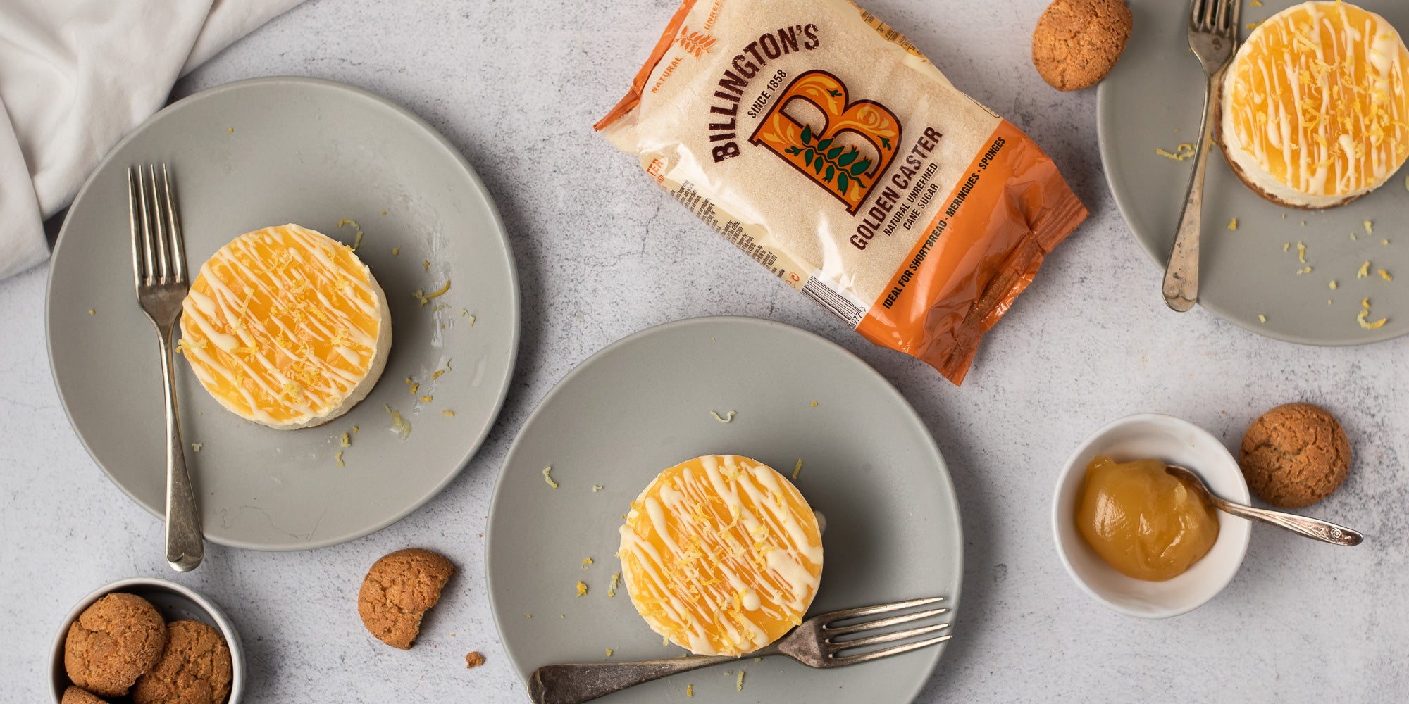 Three Mini Lemon Amaretti Cheesecakes on a plate 