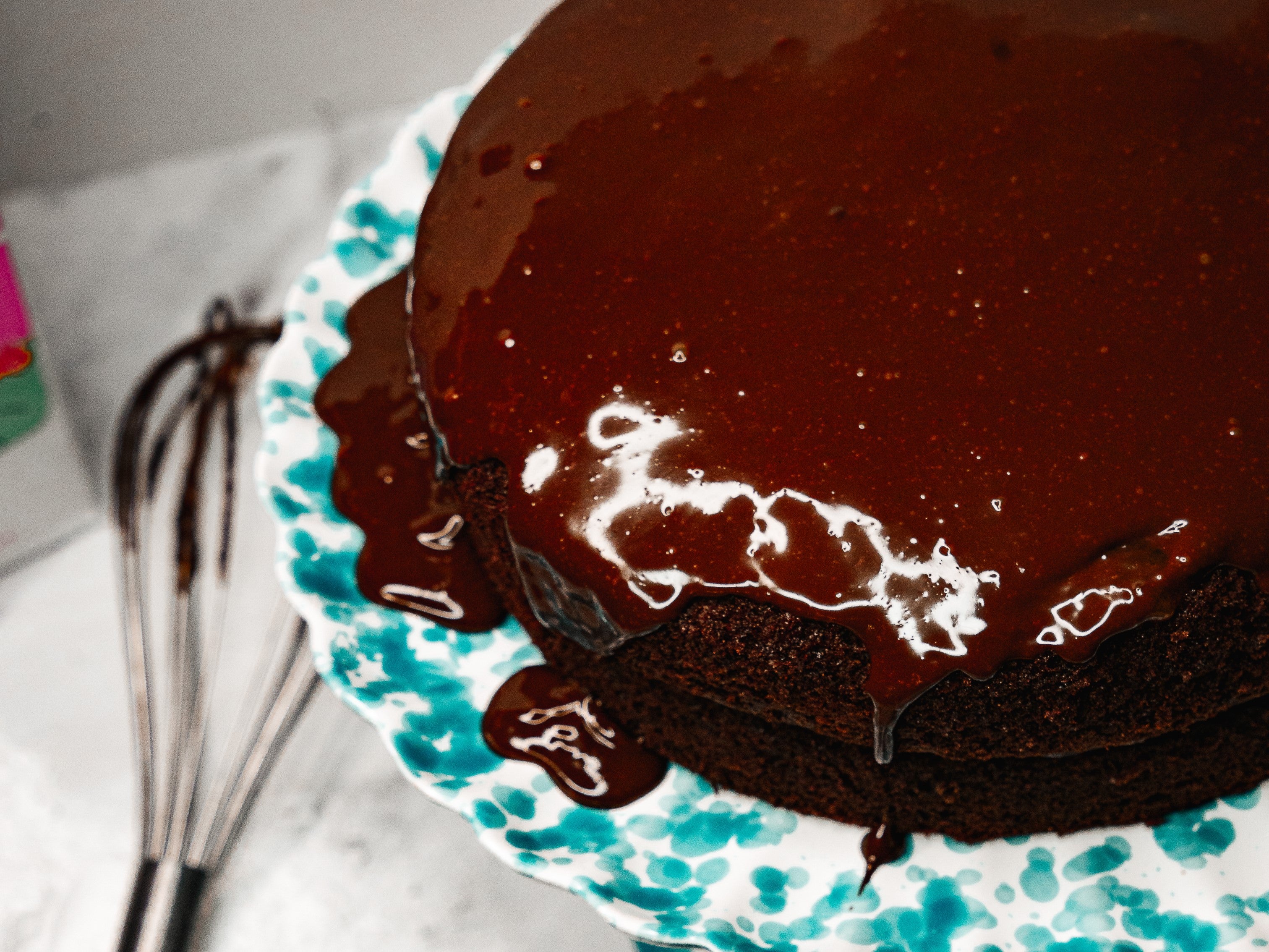 Close-up of Mary Berry's chocolate cake, topped with chocolate icing