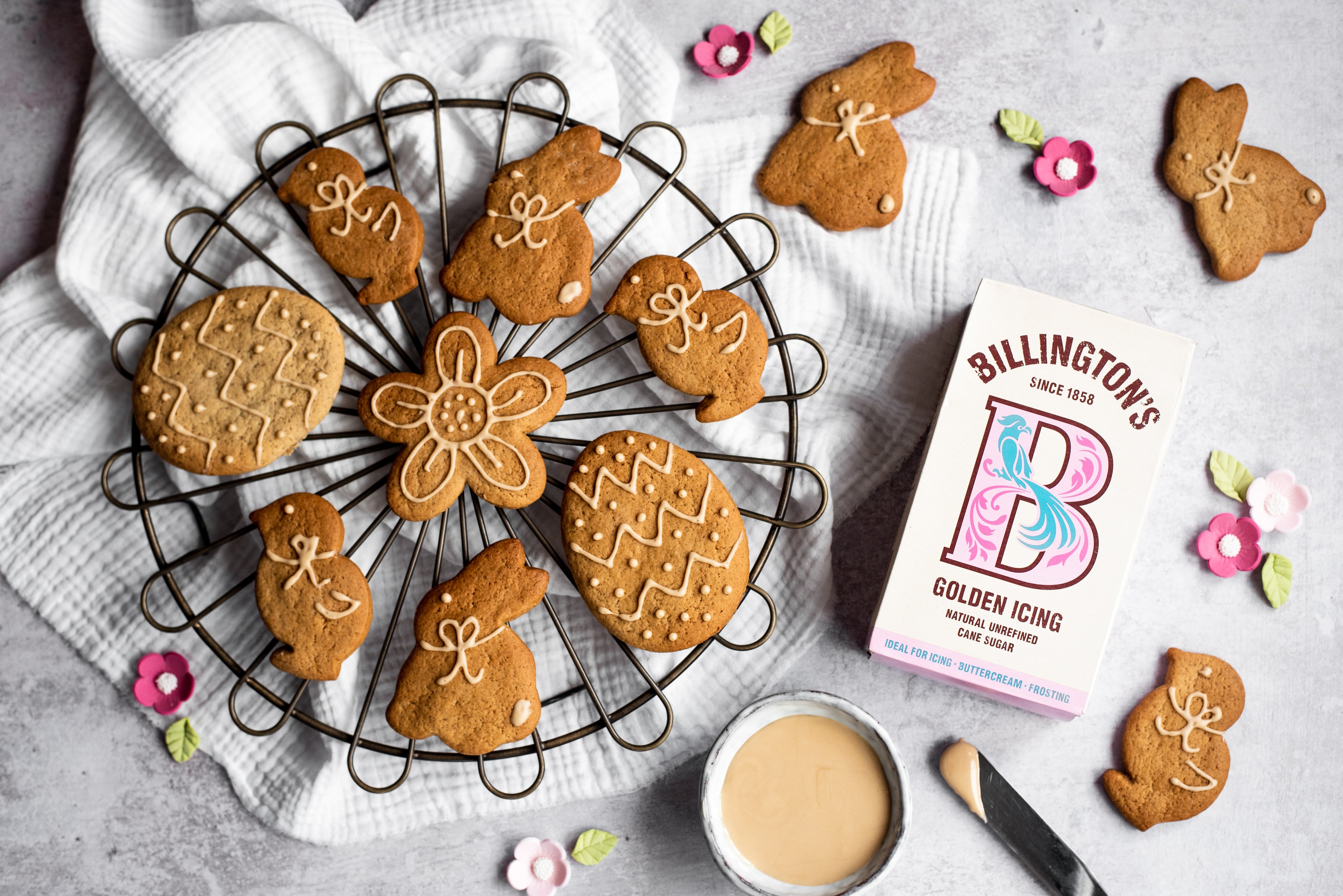 Easter shaped ginger biscuits on a cooling rack