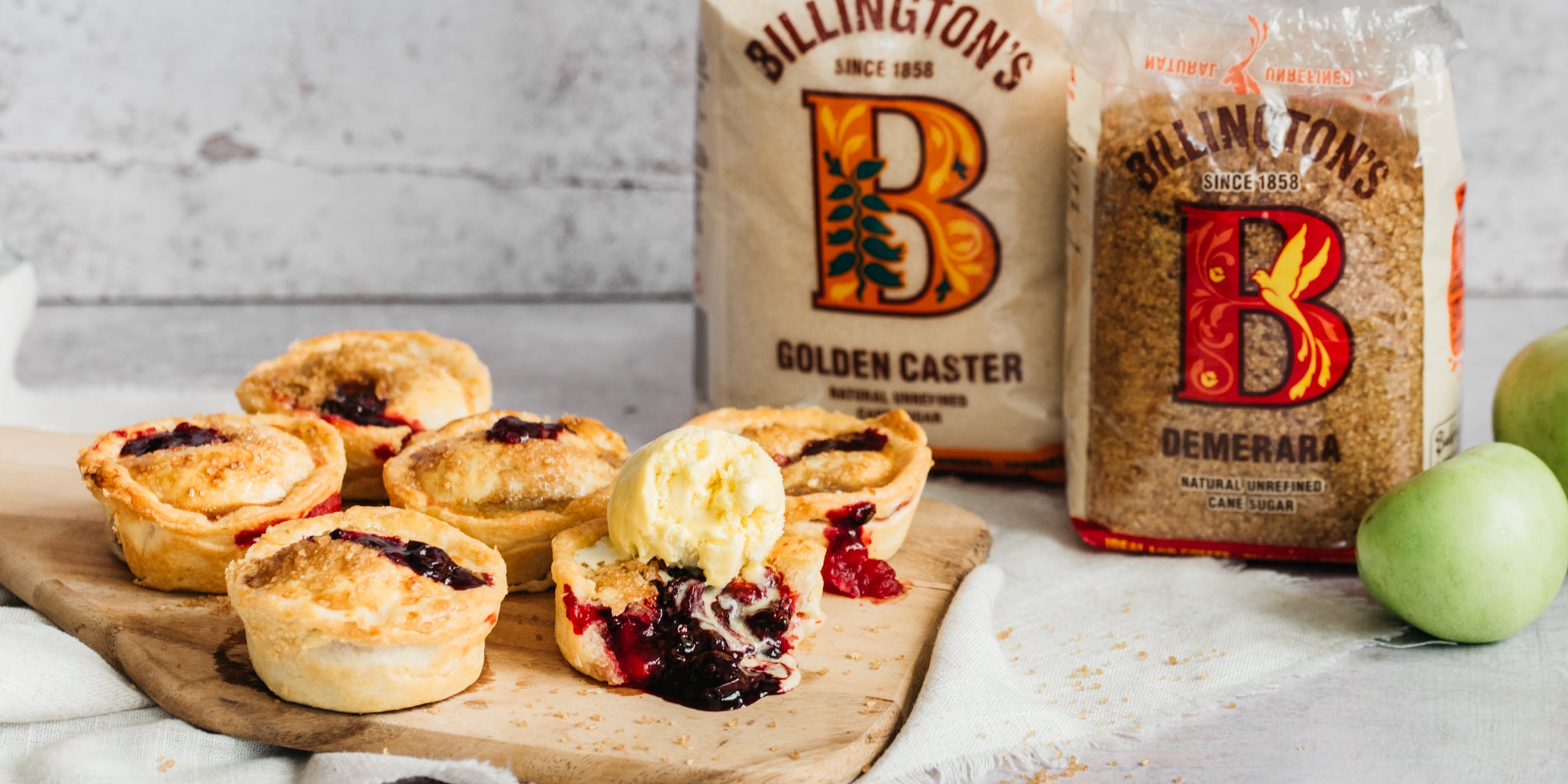 Fruit pies with ice cream topping and 2 packs of sugar