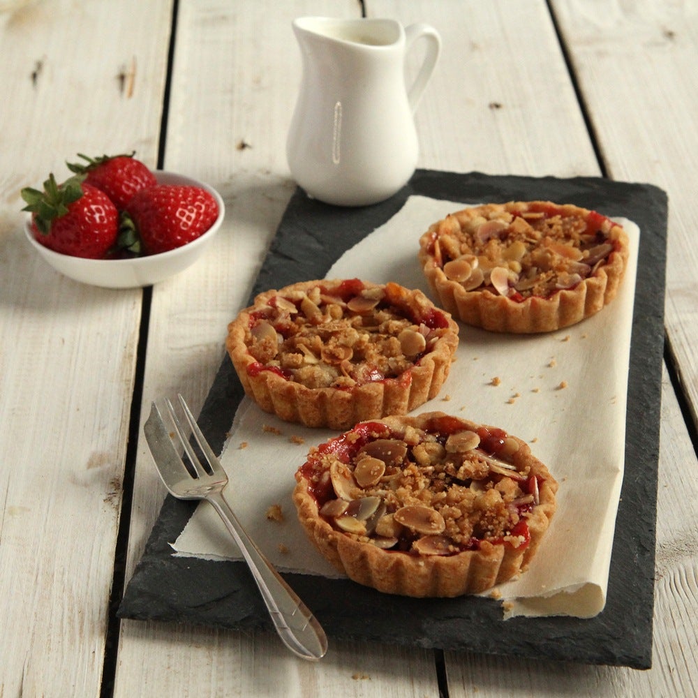 Strawberry and almond crumble tarts
