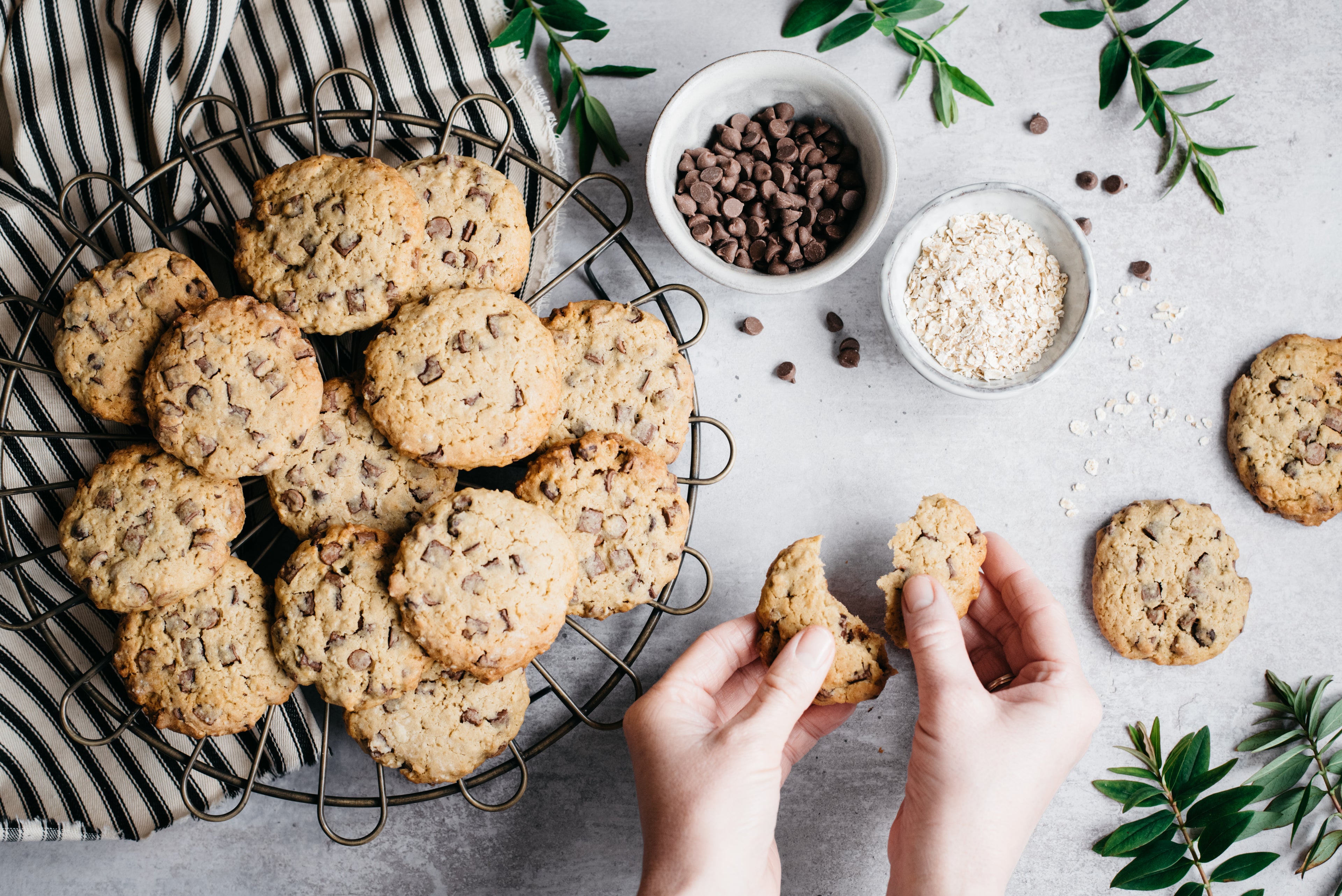 A top down view of a plate of low sugar chocolate chip cookies