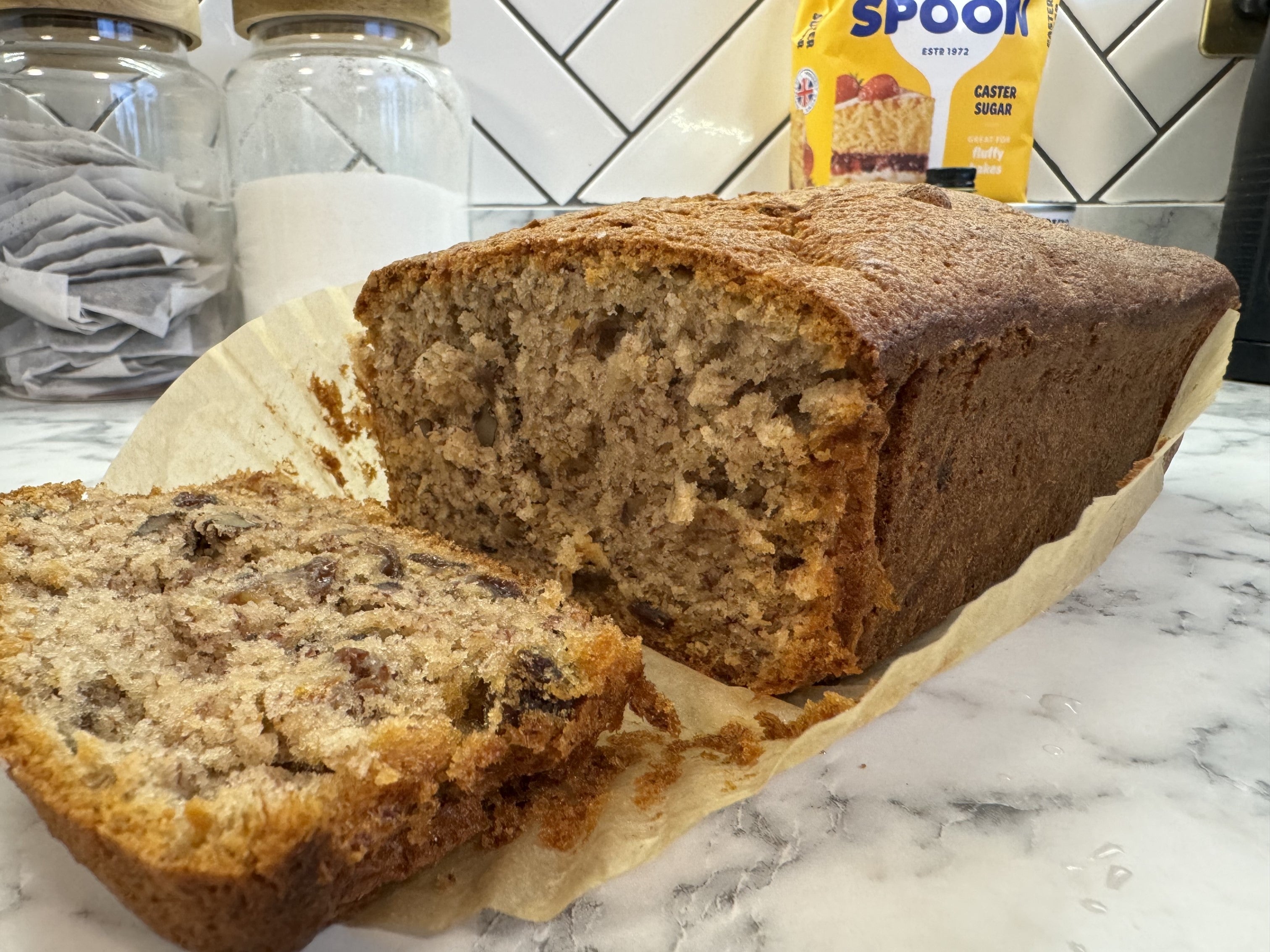 Close-up picture of Nigella Lawson's banana bread on a grey and white marble surface