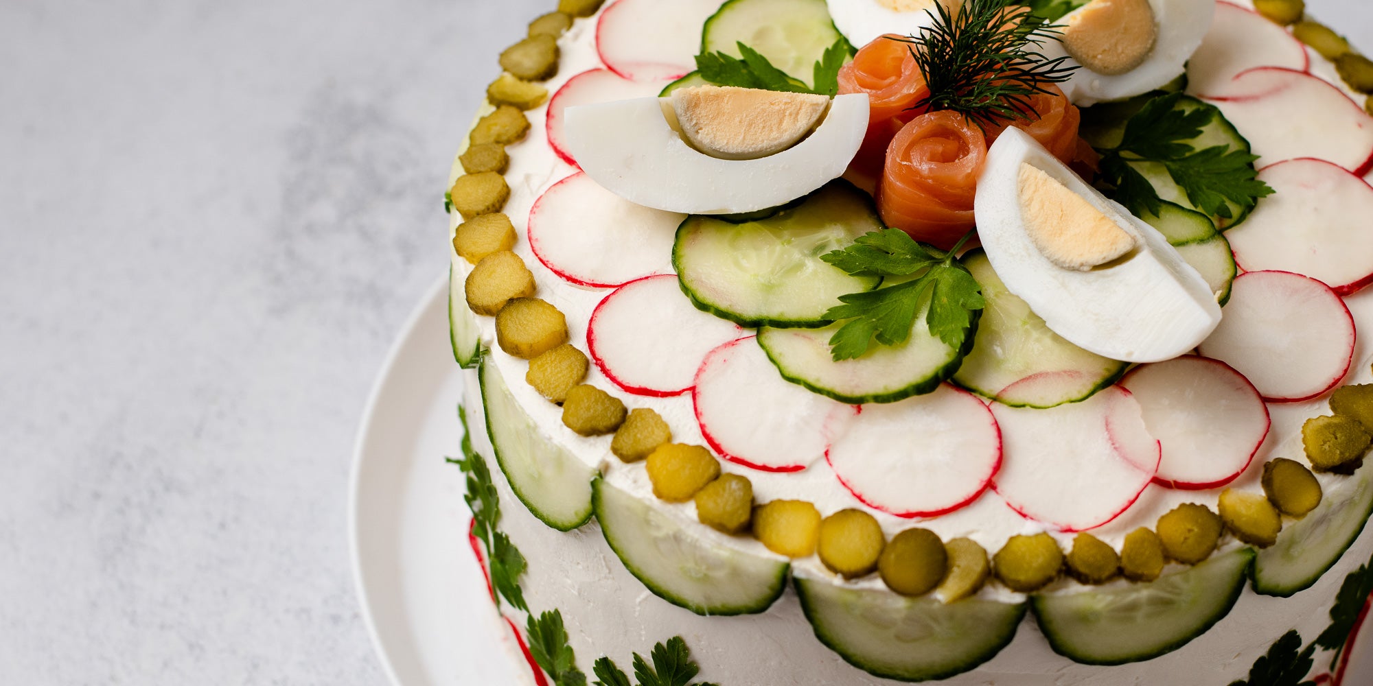 Close up of sandwich cake on white plate