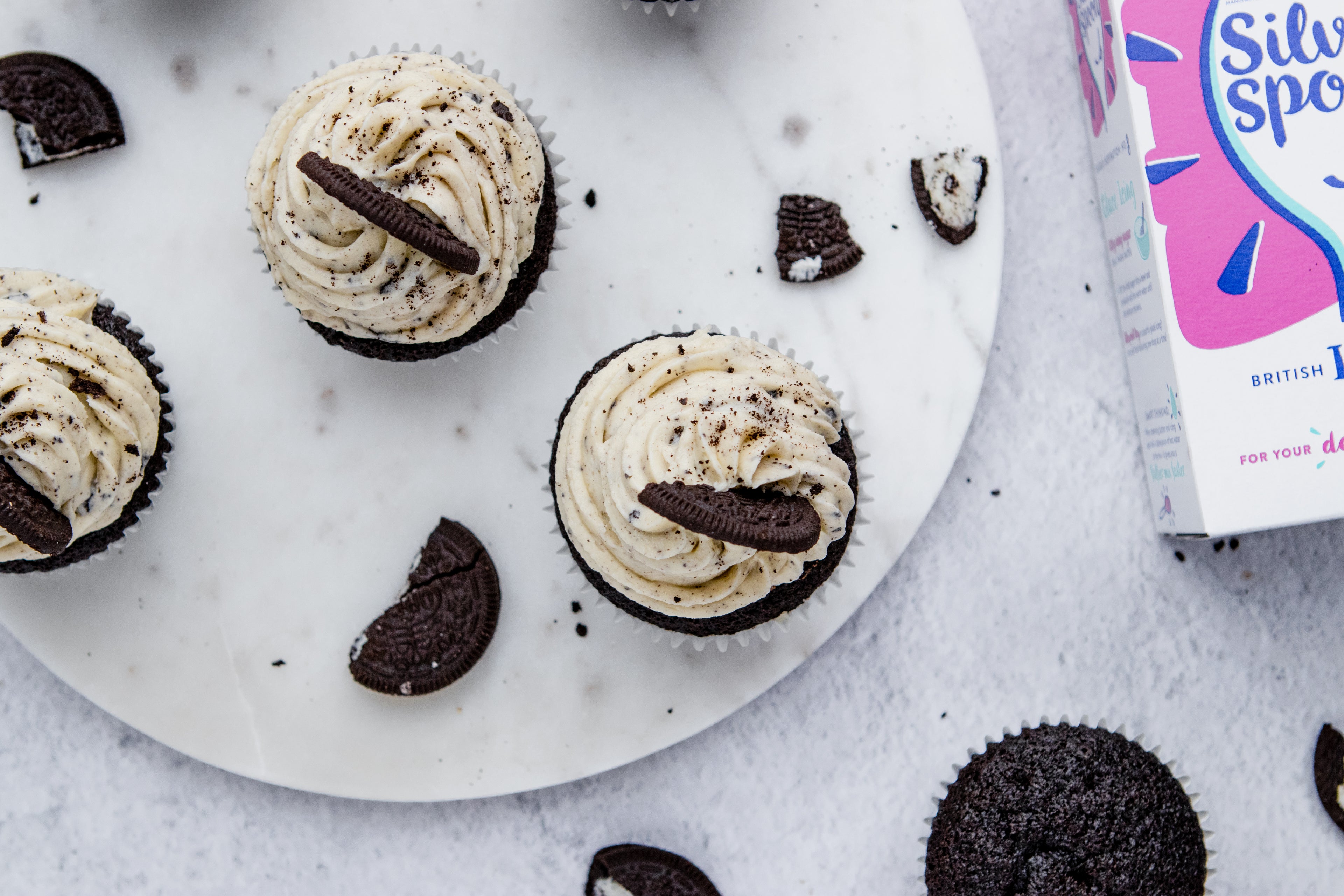 Oreo Cupcakes above view next to a box of Silver Spoon Icing sugar