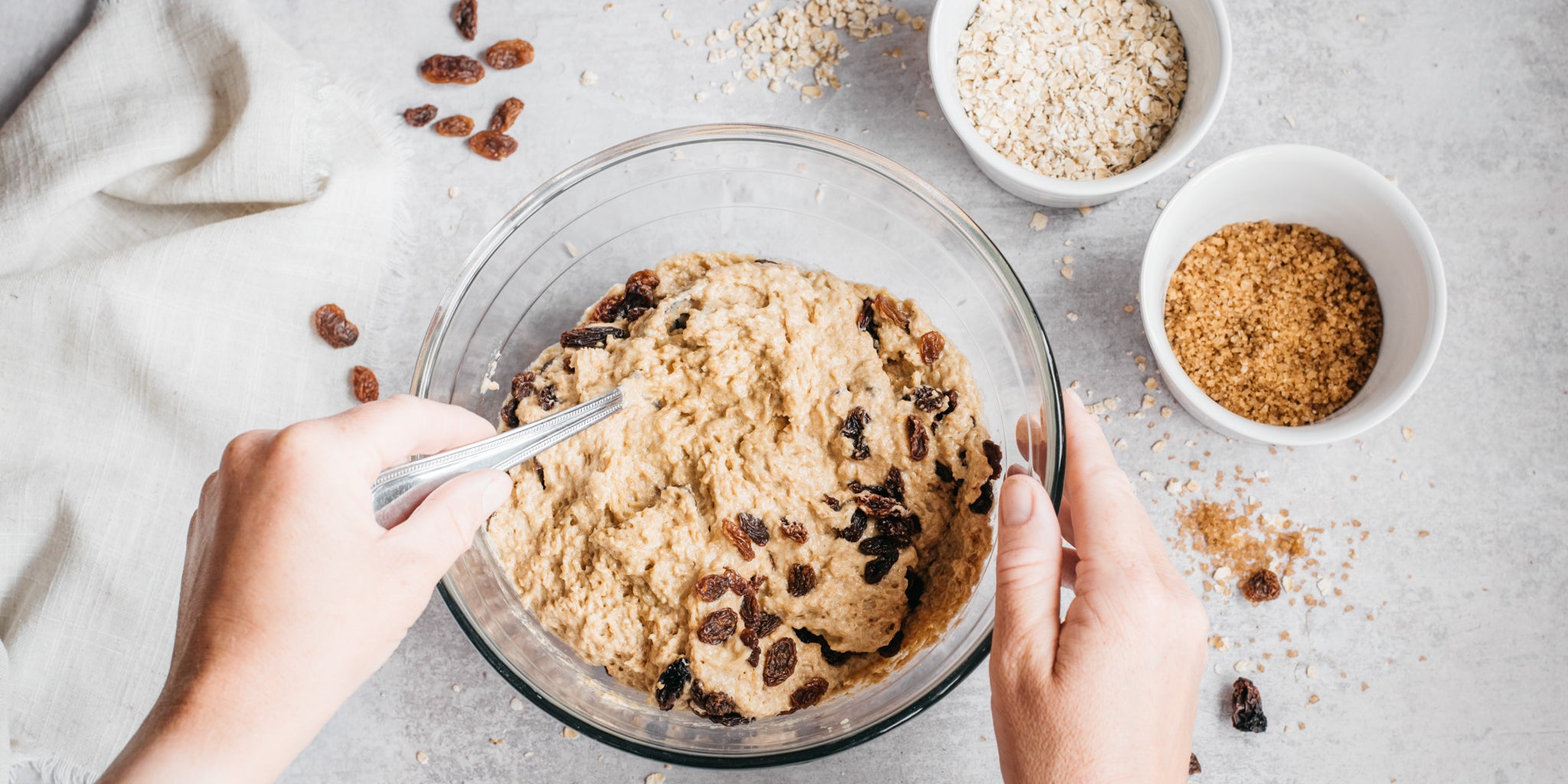 Ingredients being stirred in a clear bowl