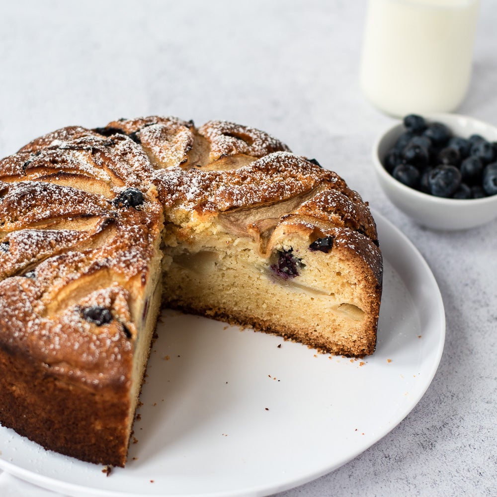 cake on a plate with slice removed