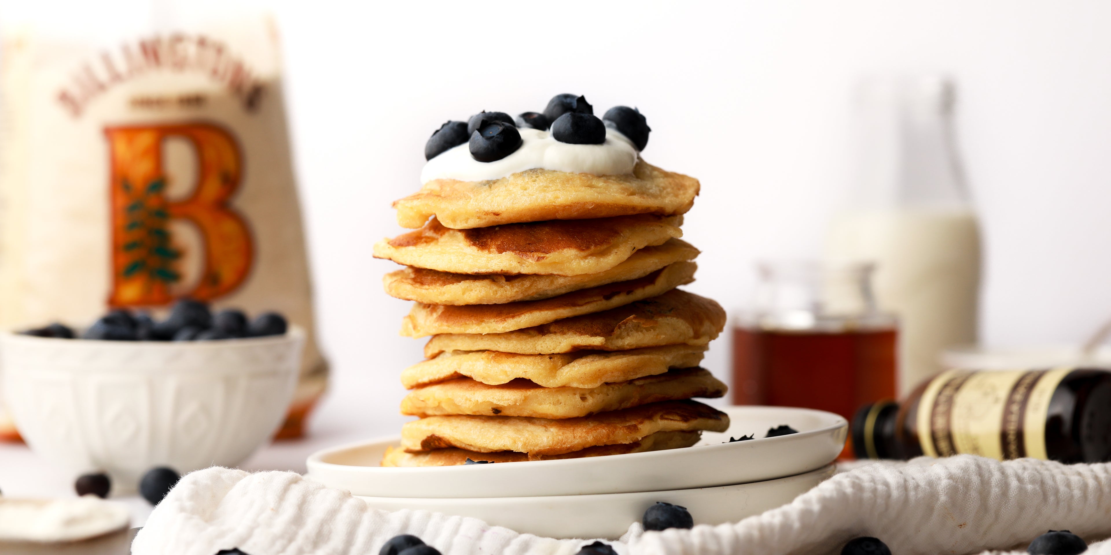 Stack of pancakes with blueberries on top 