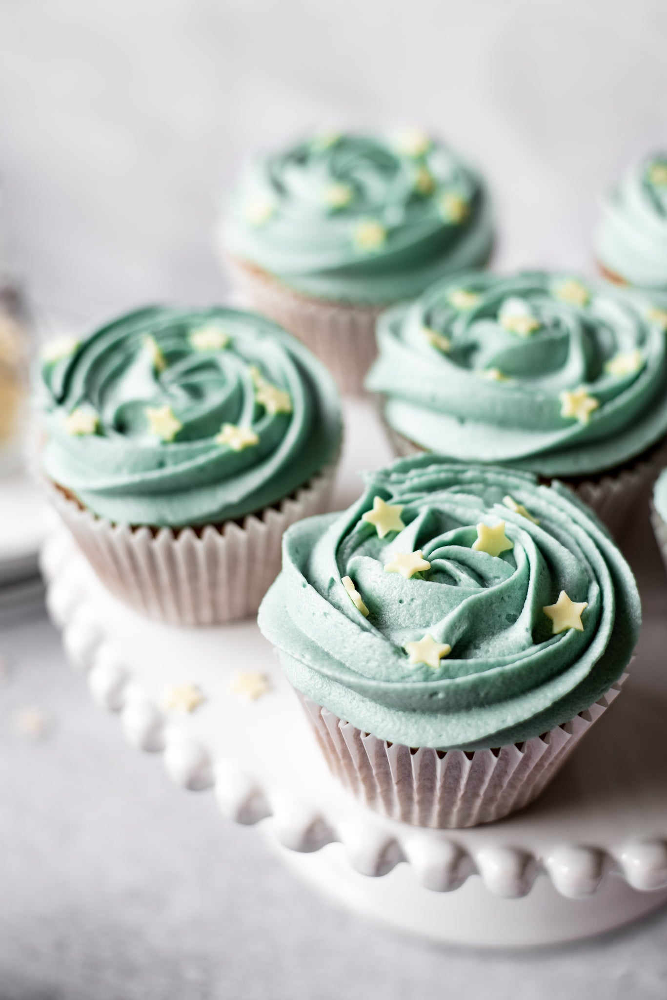 Earl Grey cupcakes with blue buttercream icing
