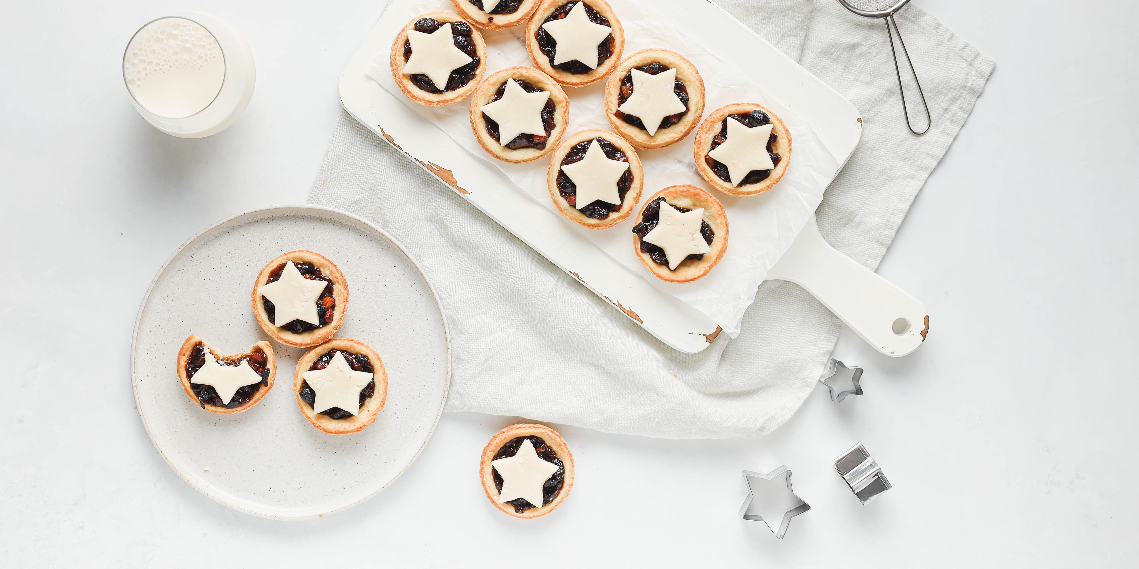 A top down view of a board of vegan mince pies