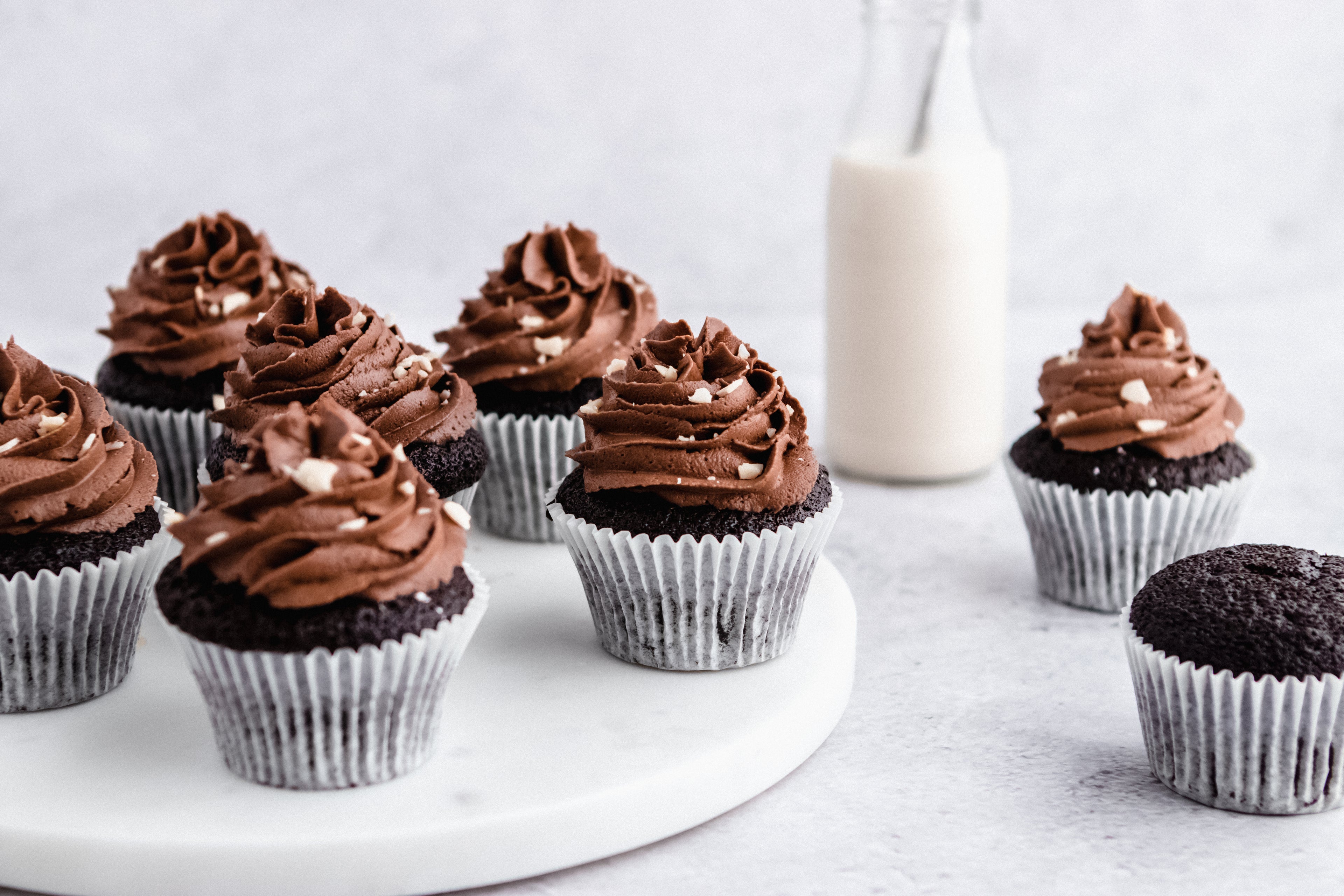 Nutella Cupcakes with a glass bottle of milk in the background
