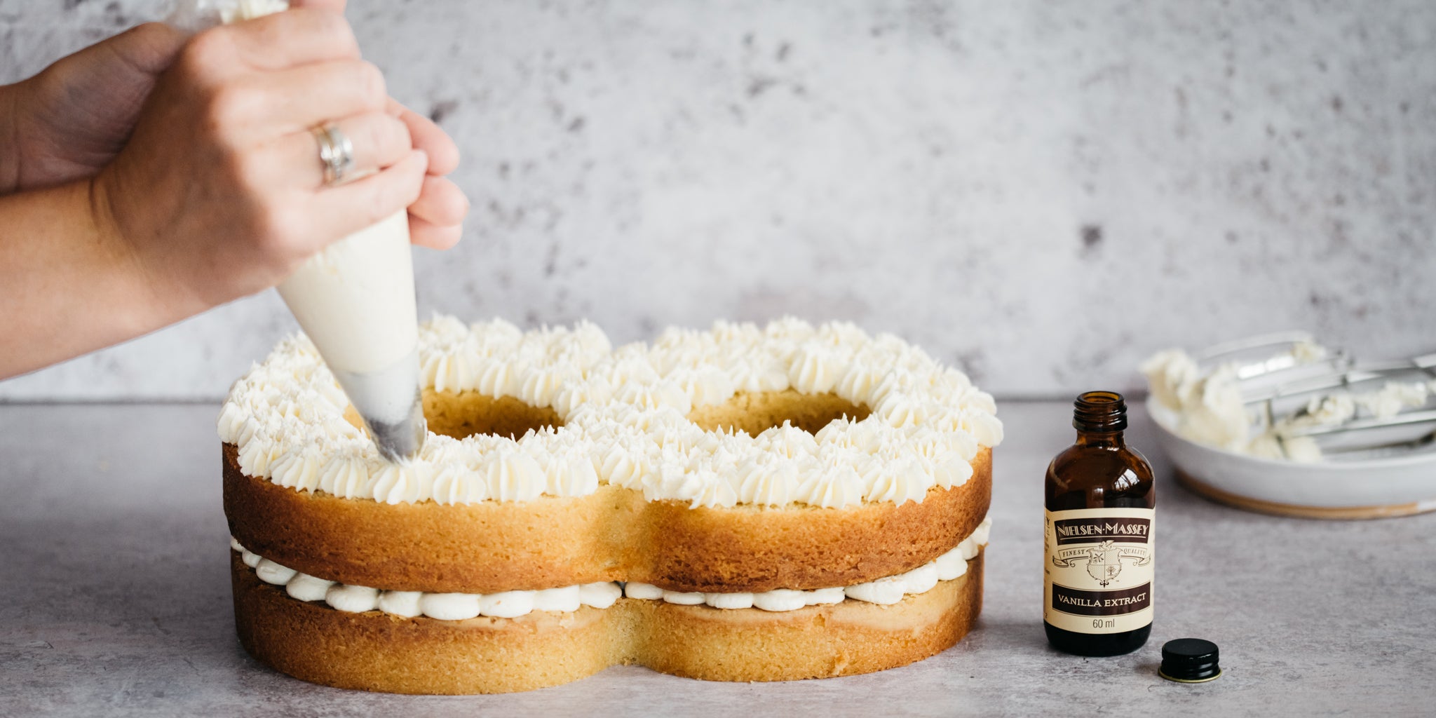 Hand piping Number Cake with Vanilla buttercream by Nielsen Massey