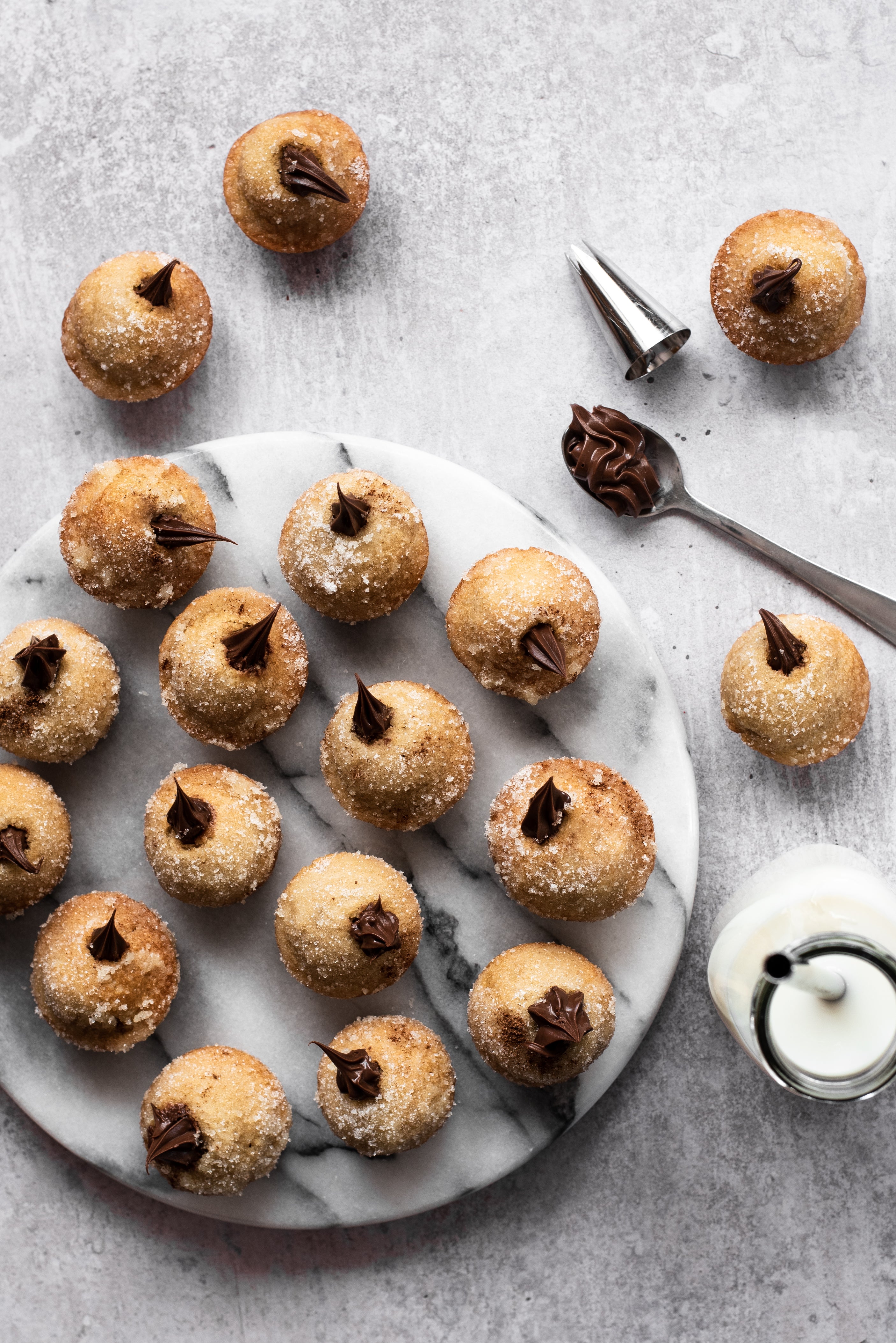 Plate of Nutella filled doughnuts