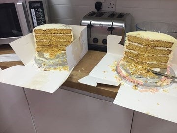 two cakes half eaten side by side