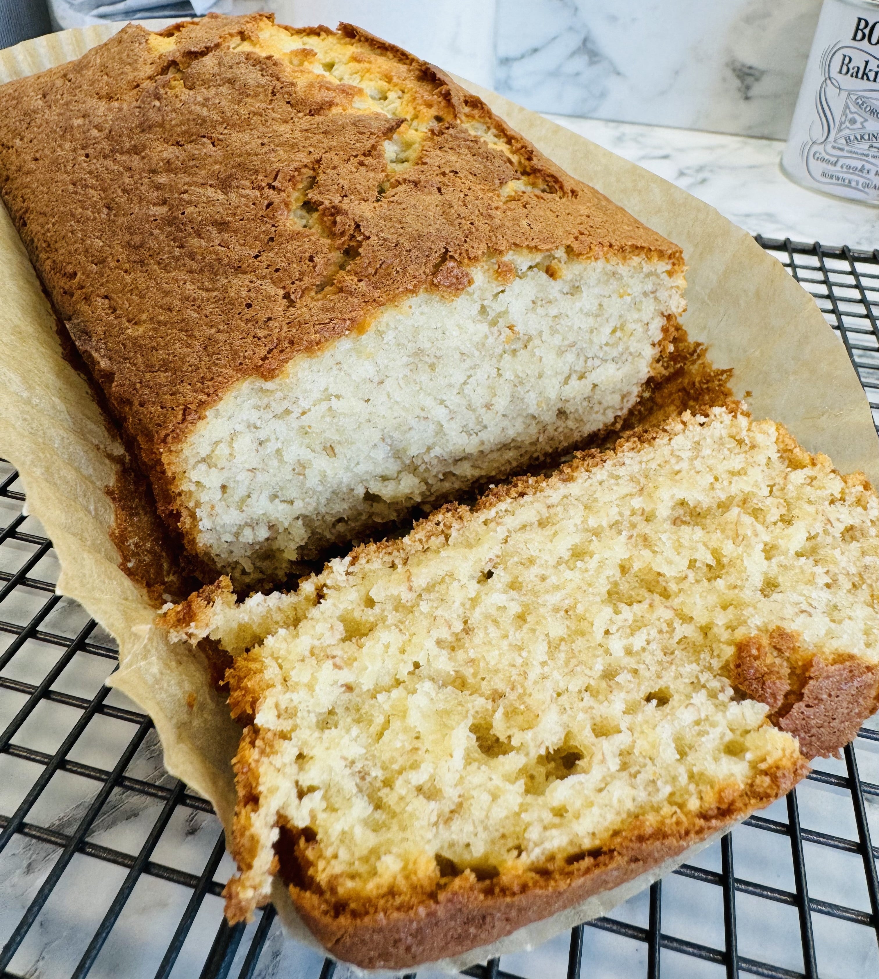 Close-up of Mary Berry's banana bread showing the loaf's fluffy interior and crumbs