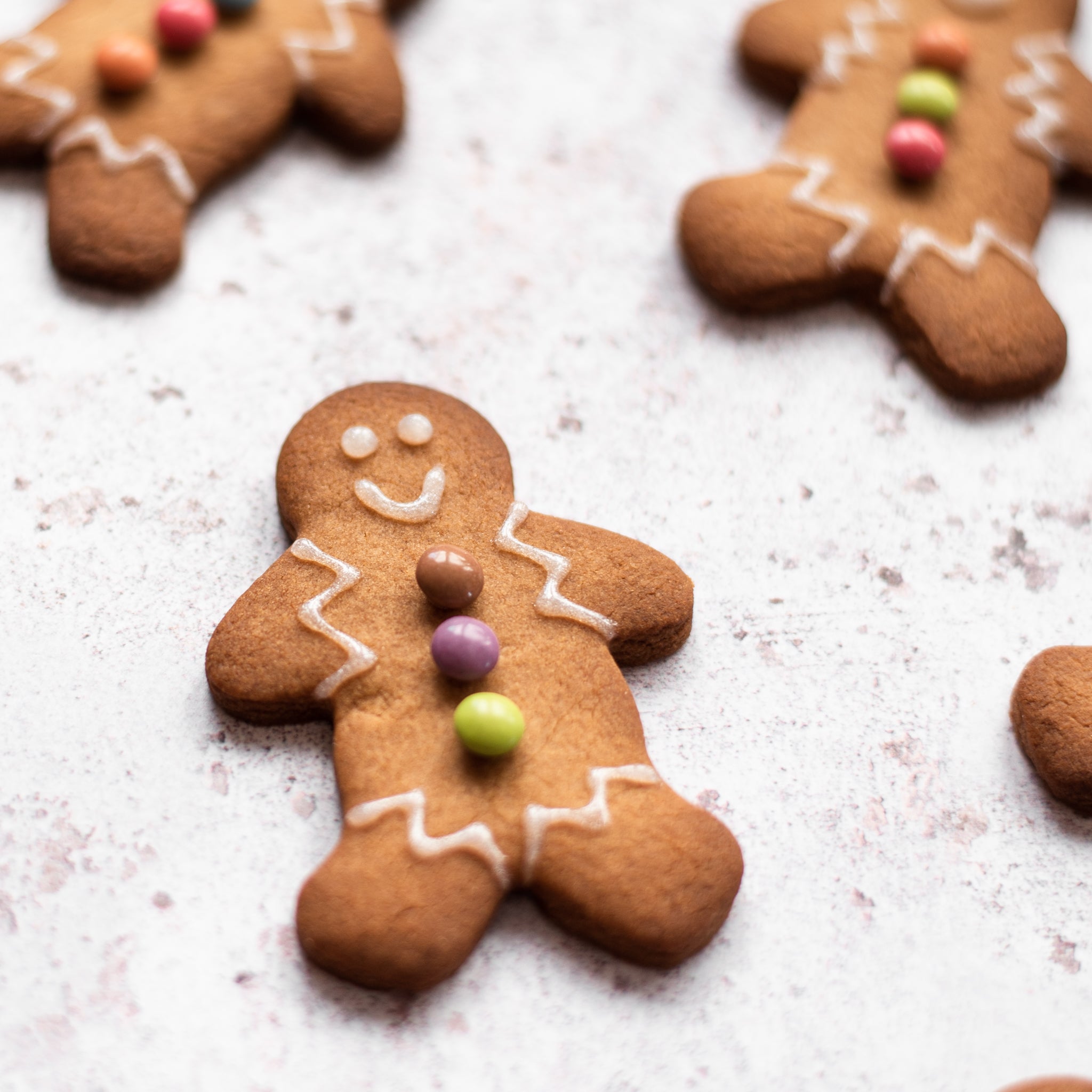 Gingerbread men decorated with white icing