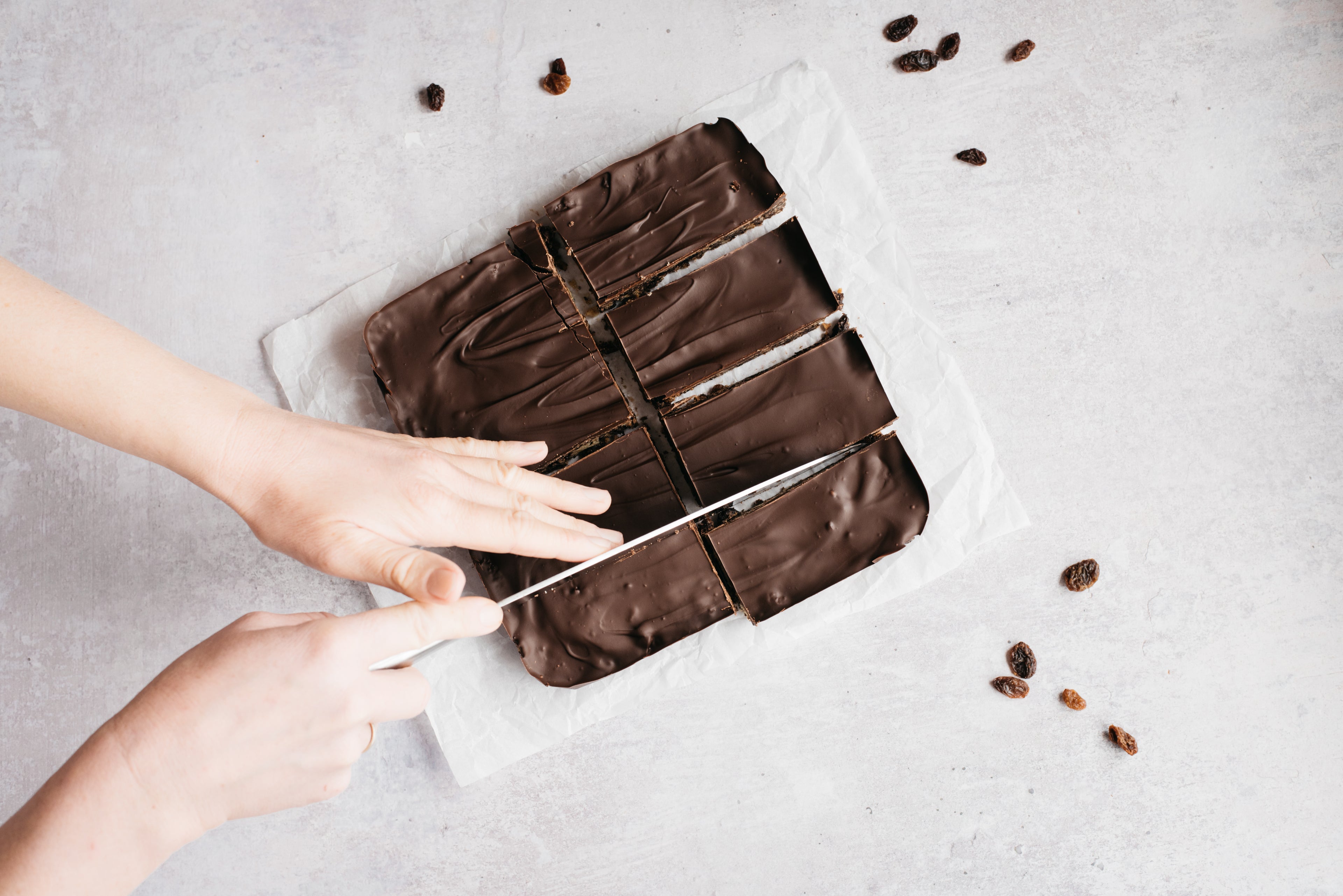 Cutting chocolate tiffin into neat slices