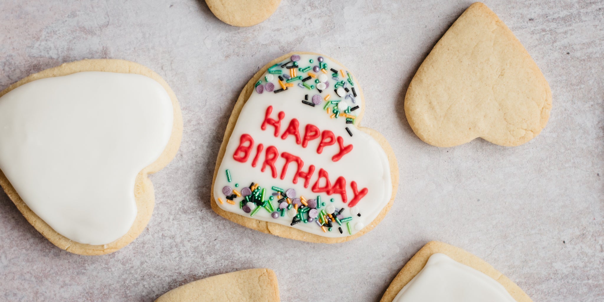 Message Biscuit decorated with 'Happy Birthday' writing in icing