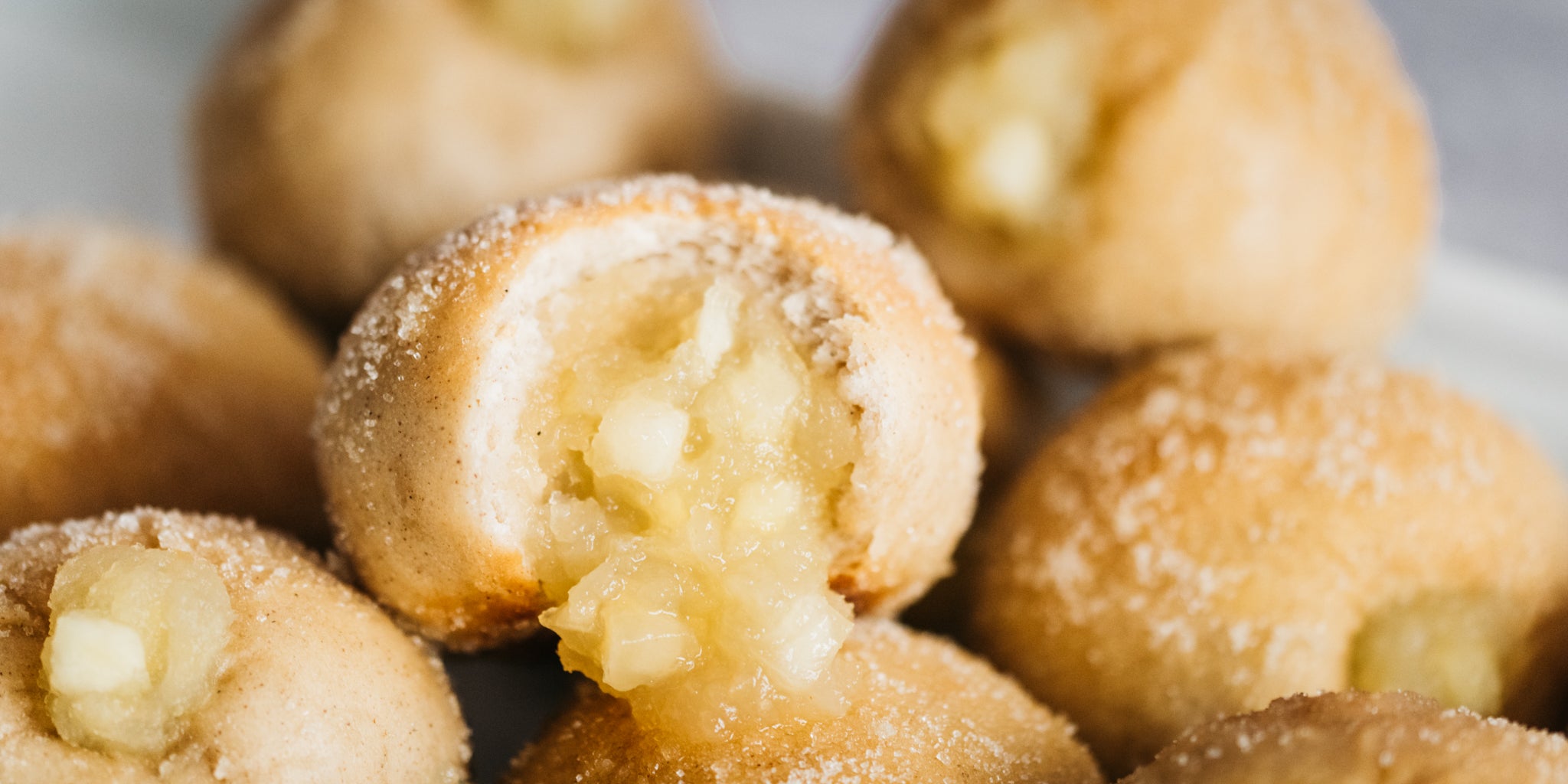 Apple doughnut with a bite taken out of it