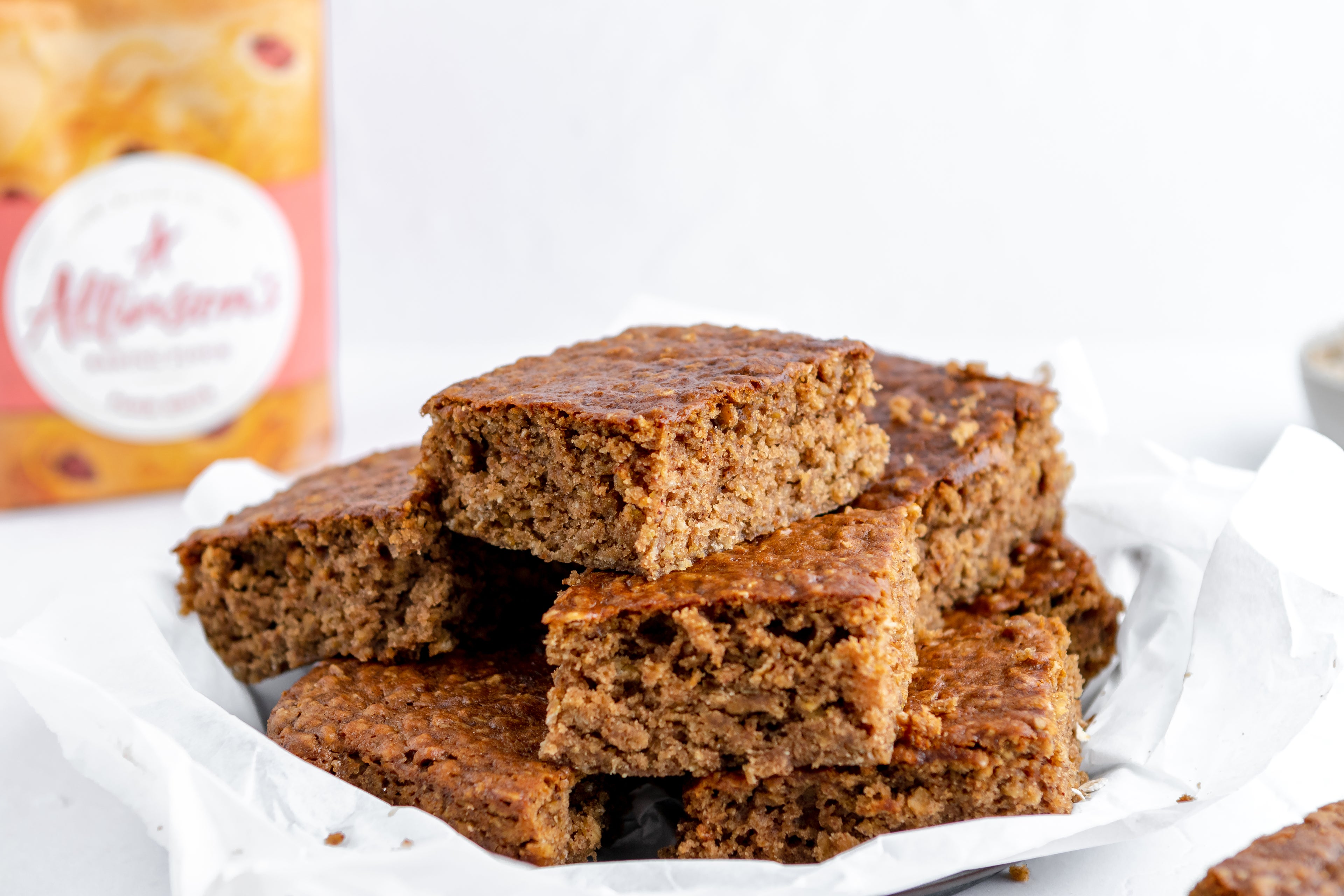 Sticky Yorkshire Parkin slices served on baking paper