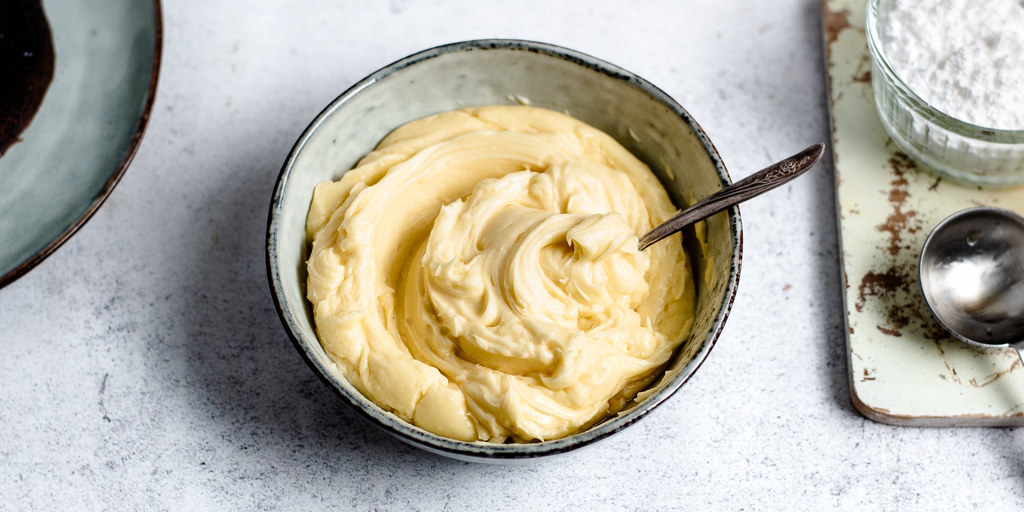 Top view of Brandy Butter in a mixing bowl with a spoon