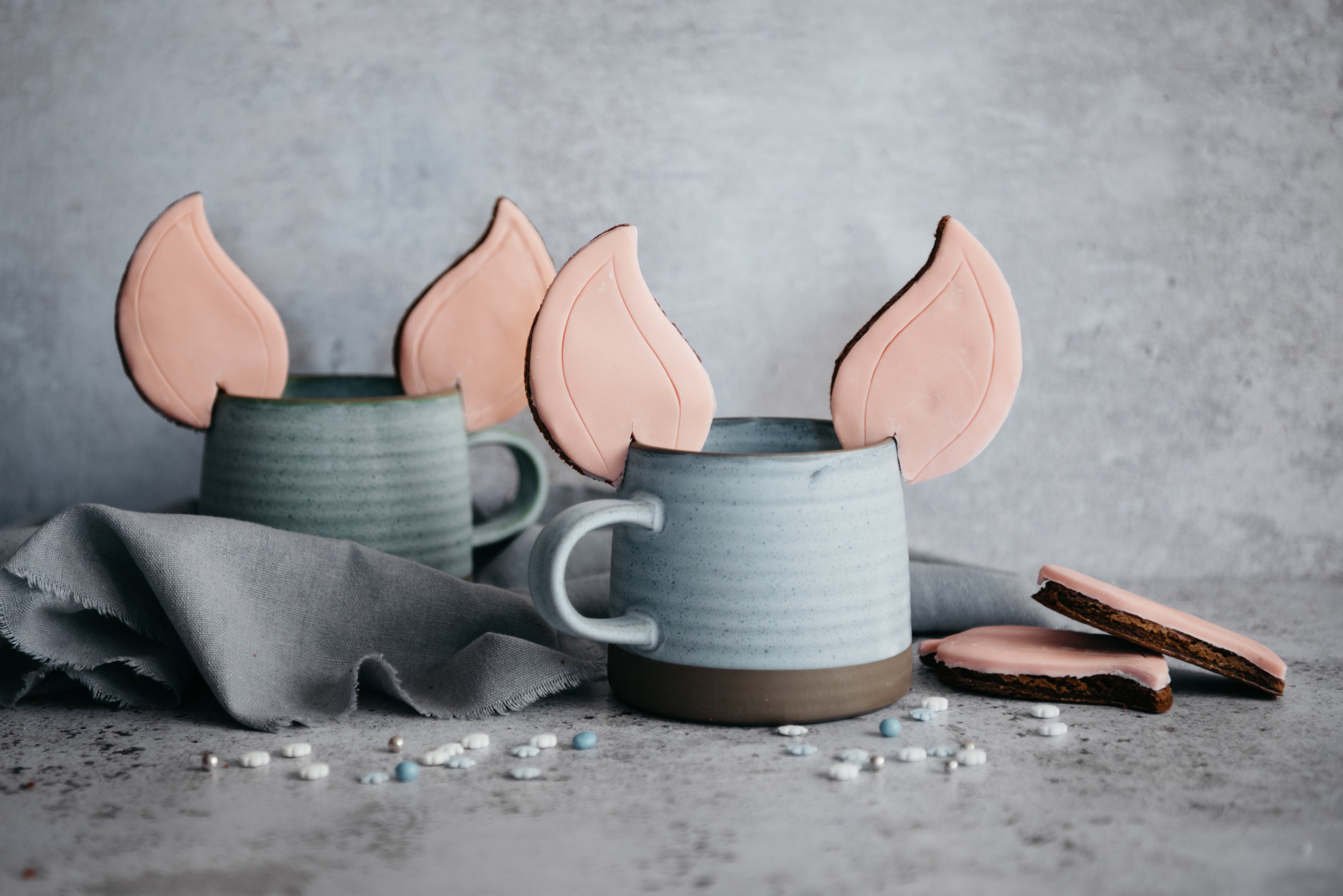 Elf Ears Gingerbread Cookies on the edge of mugs