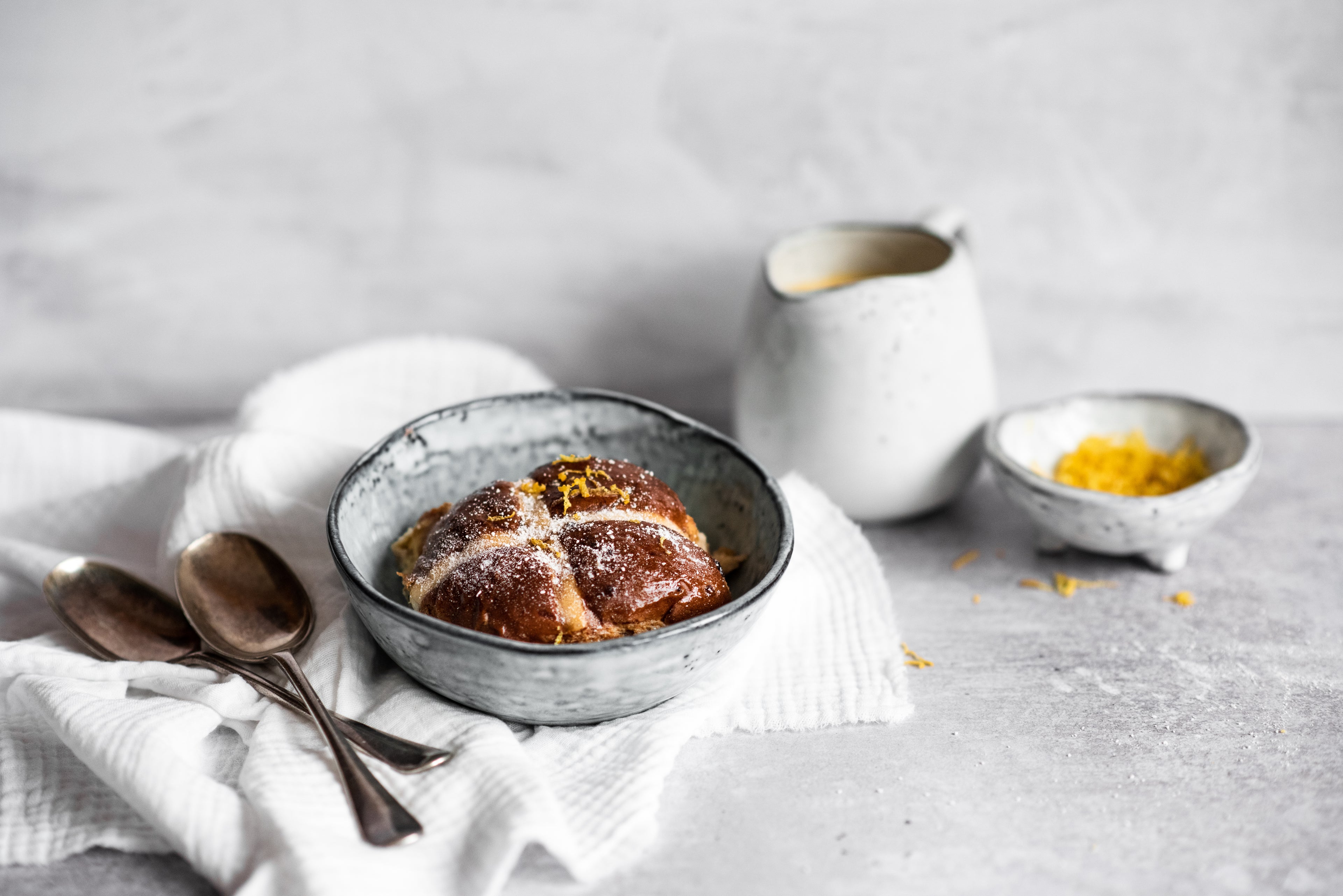 One Hot Cross Bun Bread Butter Pudding in a bowl