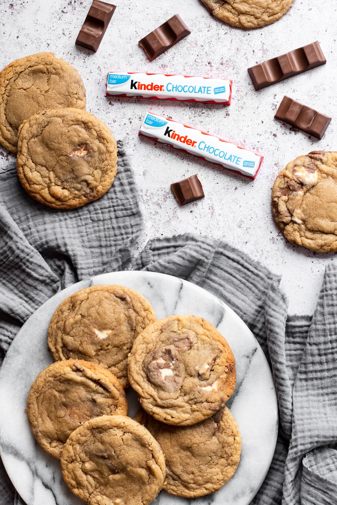 A top down view of a plate of kinder copycat millies cookies