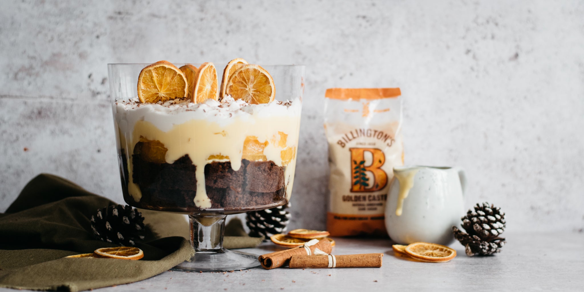 Chocolate Orange Trifle with Billington's golden unrefined caster sugar, next to a jug of Baileys custard