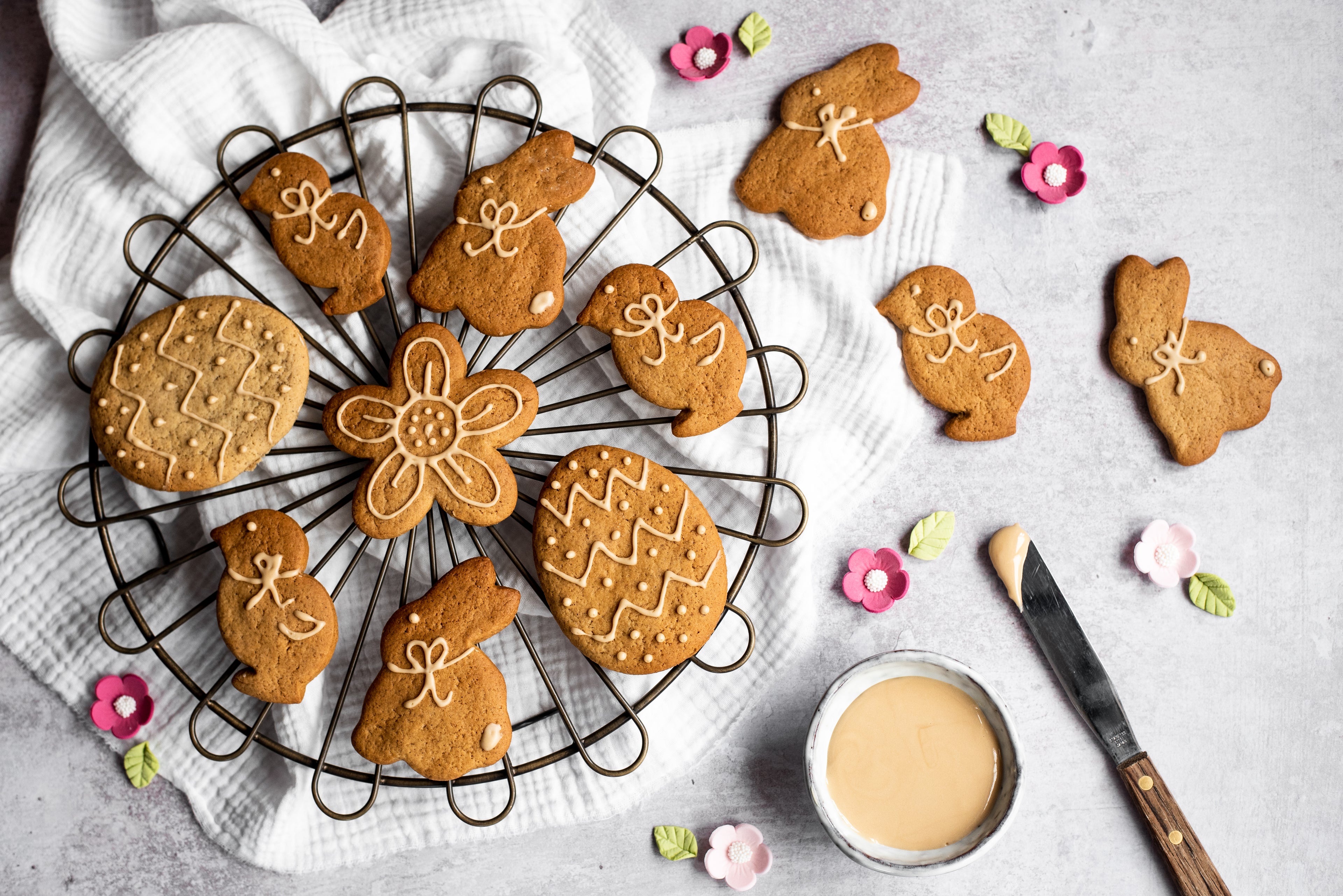 Easter shaped ginger biscuits on a cooling rack