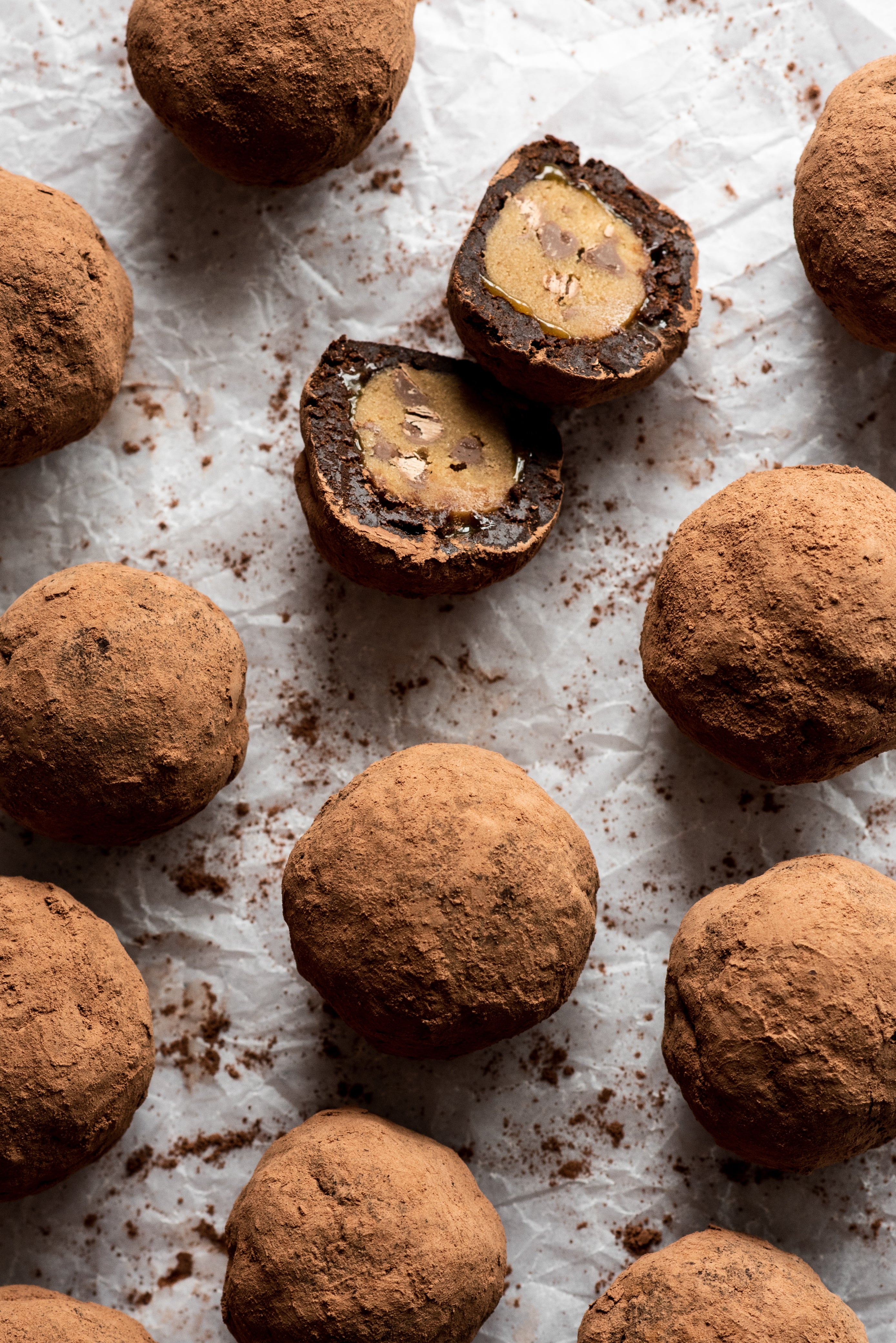 Cocoa dusted brownie truffles with one split in half