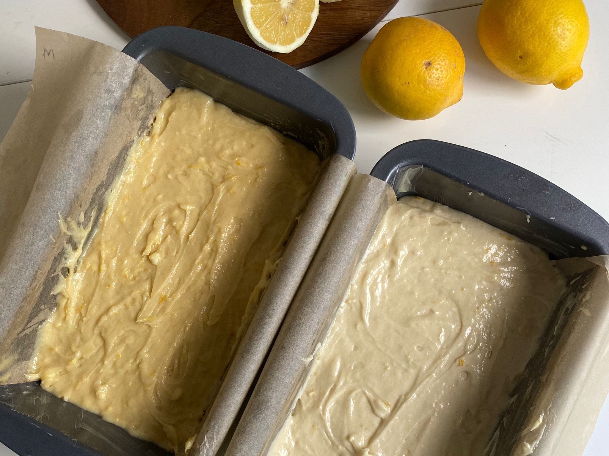 Cake mixture in baking tins for Mary Berry and Nigella Lawson's lemon drizzle cake