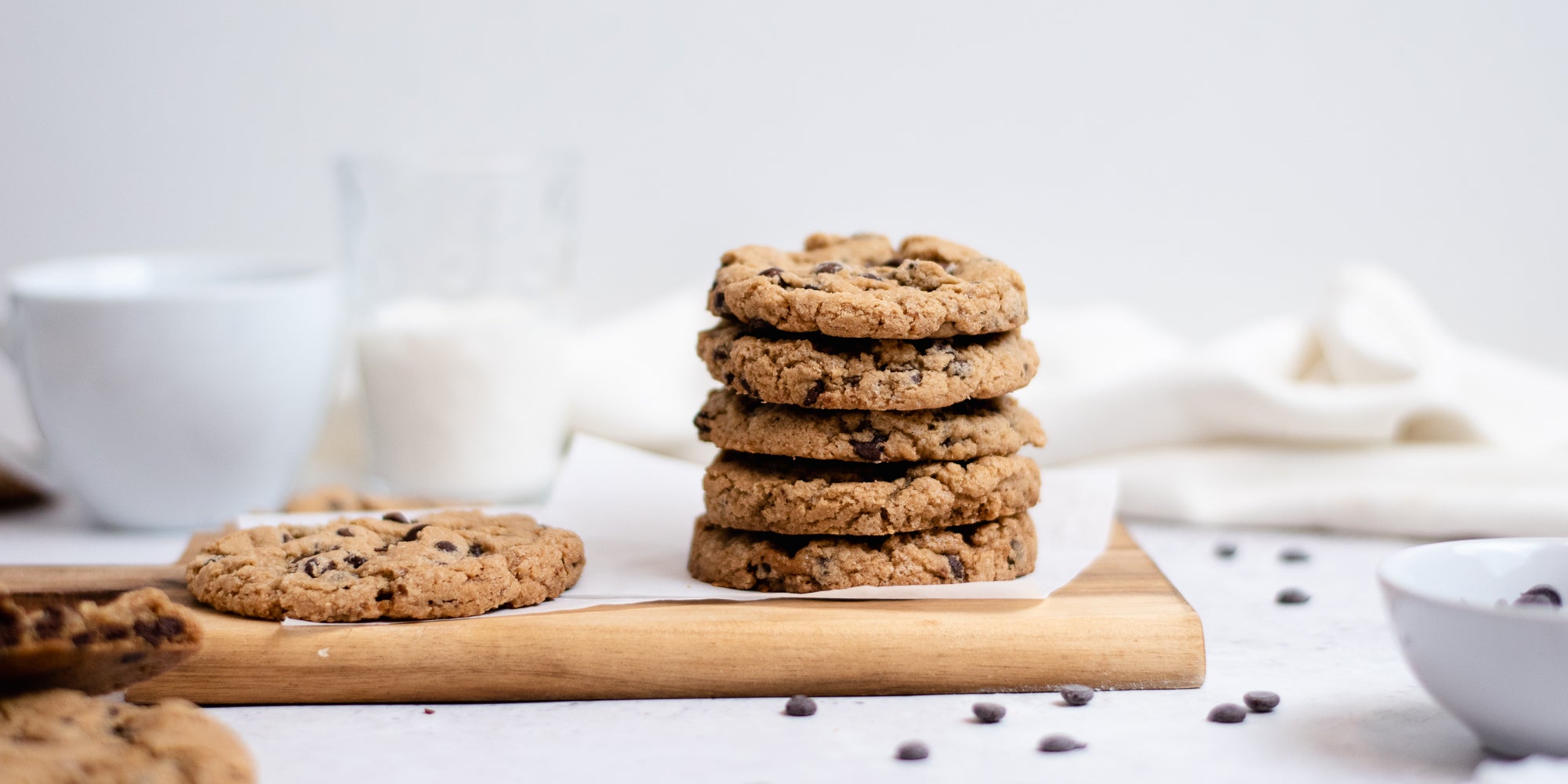 Side on view of a stack of vegan and gluten free chocolate chip cookies