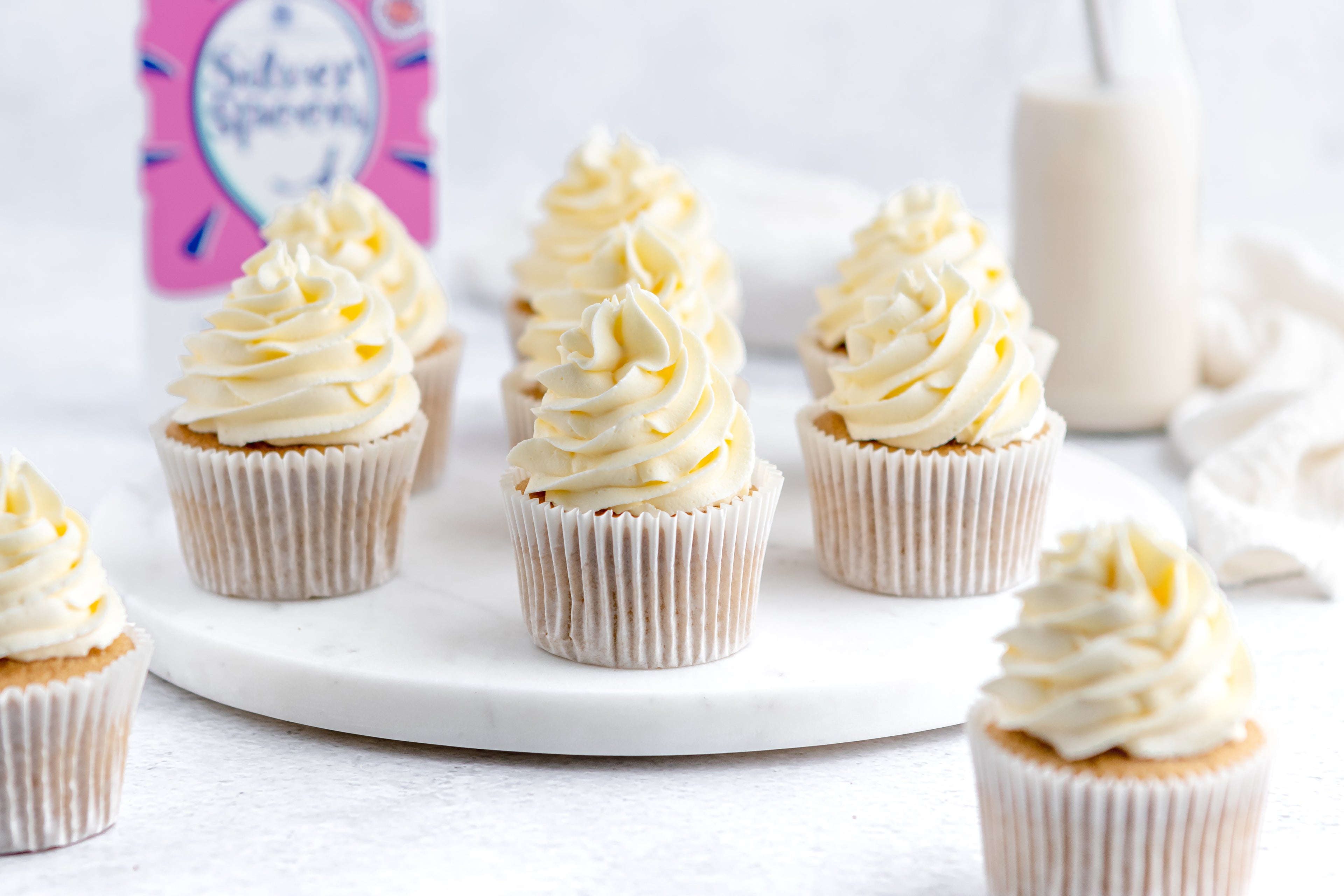 Gluten Free Cupcakes with buttercream on a serving board