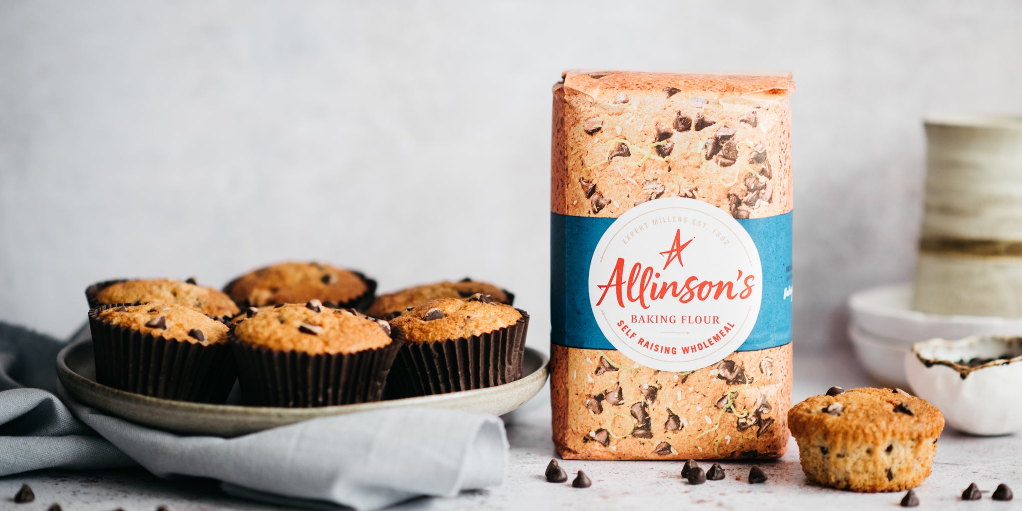 Wholemeal Banana & Chocolate Chip Muffins next to a bag of Allinson's Wholemeal flour