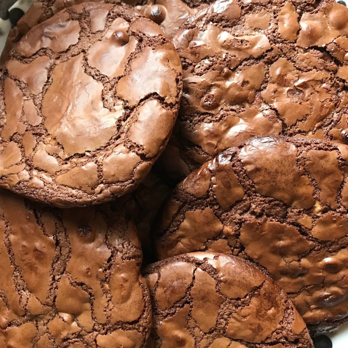 Chocolate cookies stacked on top of each other