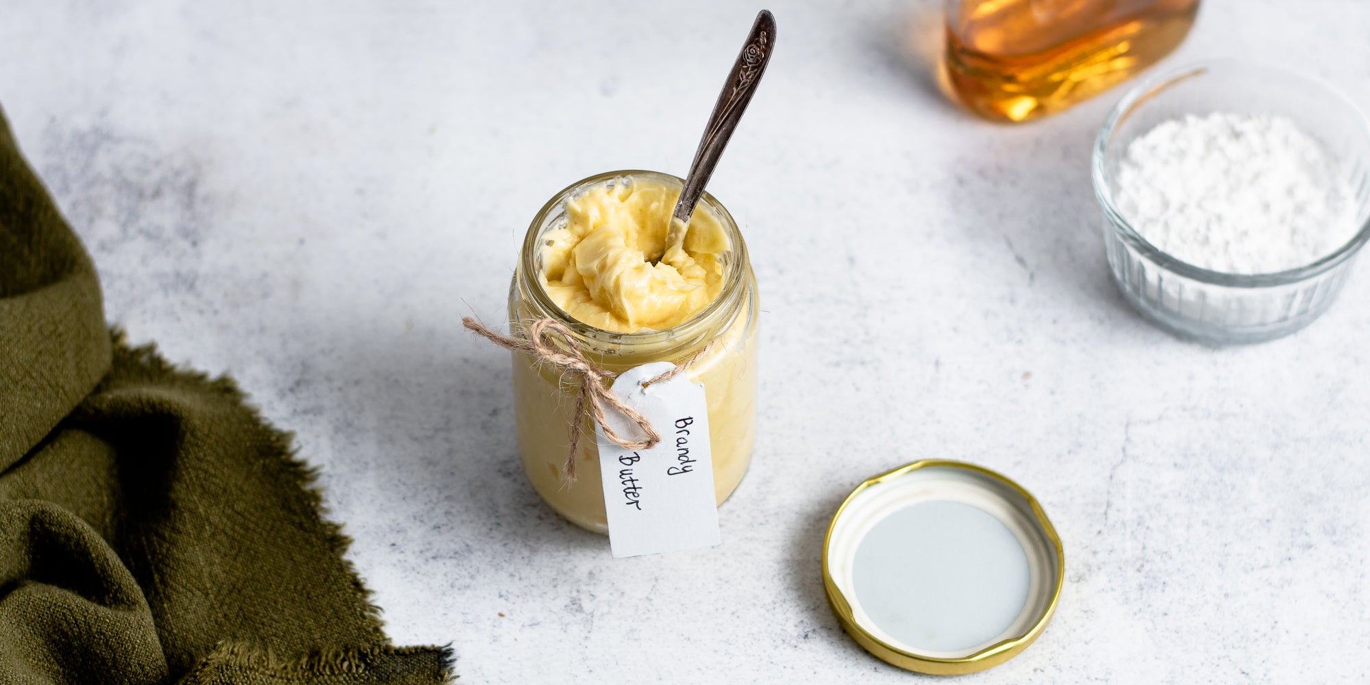 Jar of Brandy Butter with a handwritten note for a handmade gift 