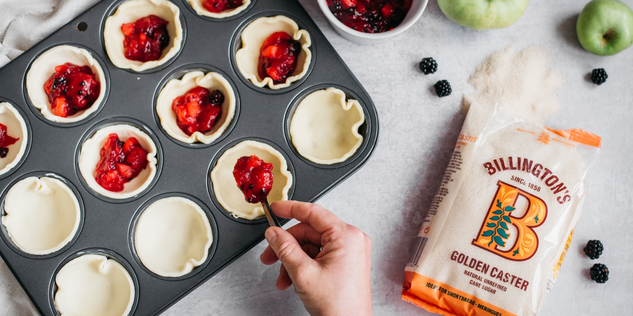 Pastry with berry filling and sugar pack