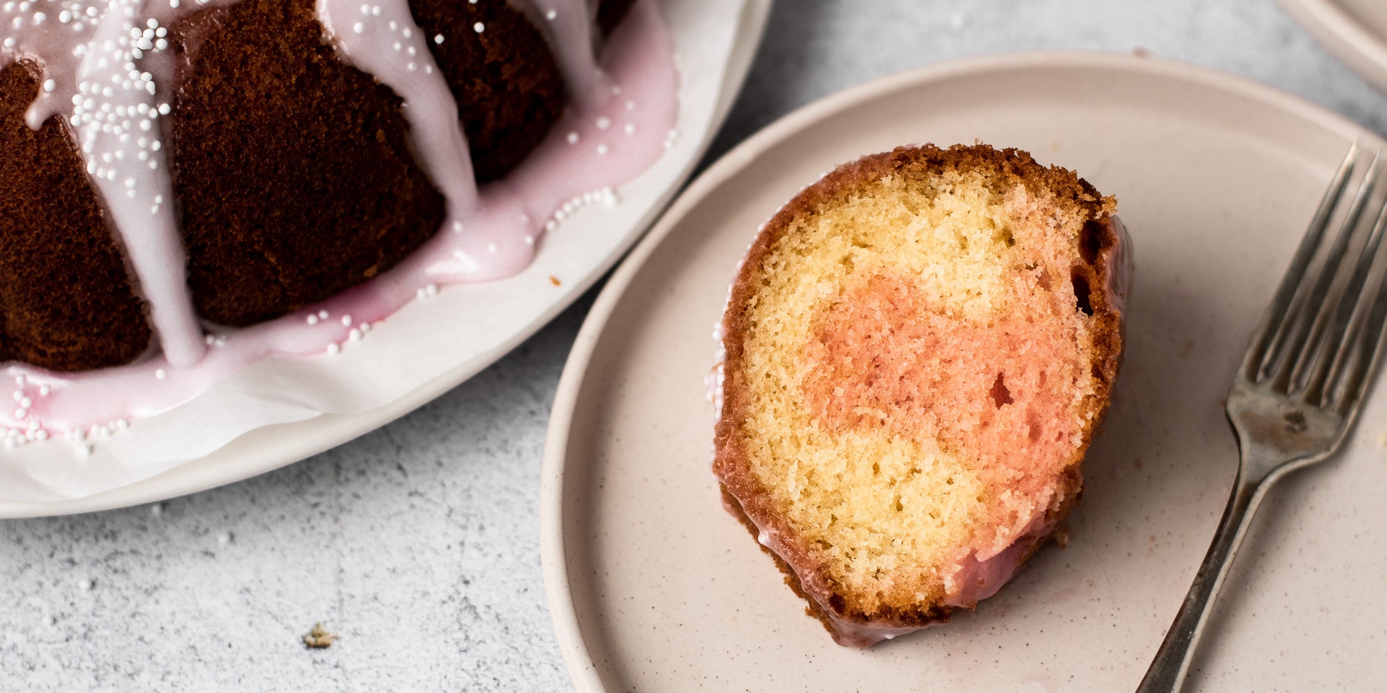 Strawberry Marble Bundt Cake slice on a plate