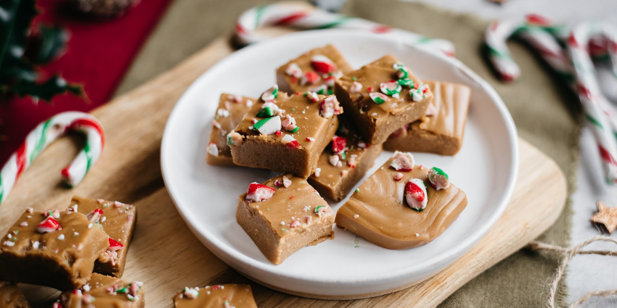 A plate of Candy Cane Fudge, sprinkled with candy cane pieces