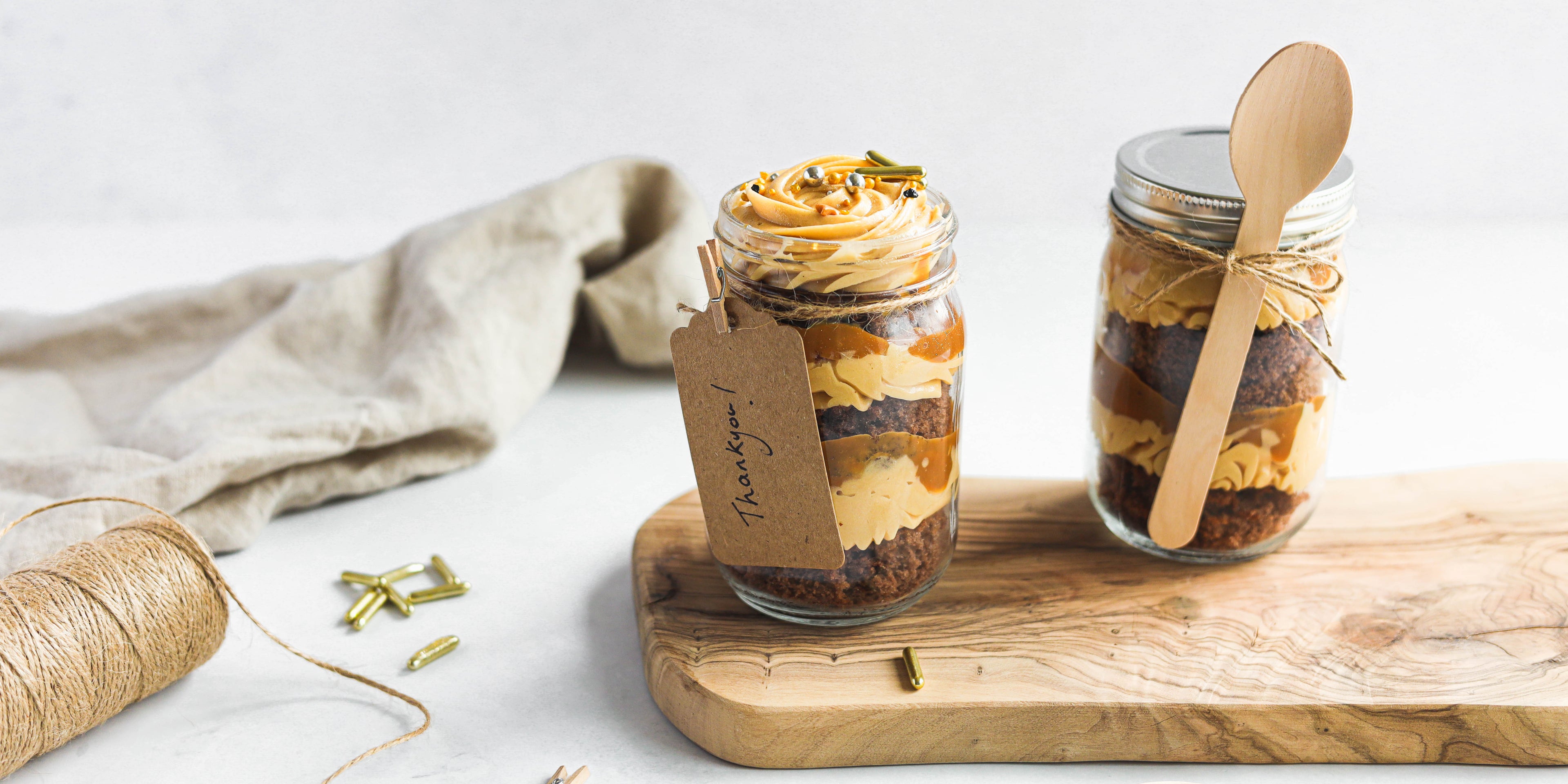 Salted Caramel Cake Jar with thank you label, hand tied with a spoon