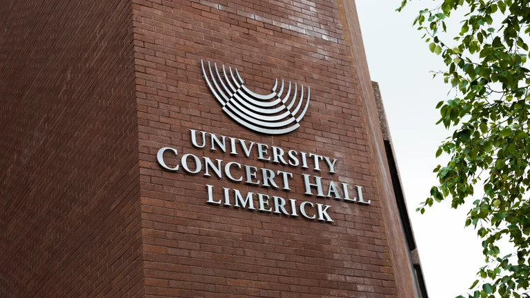 University of Limerick campus with conference impact story branding