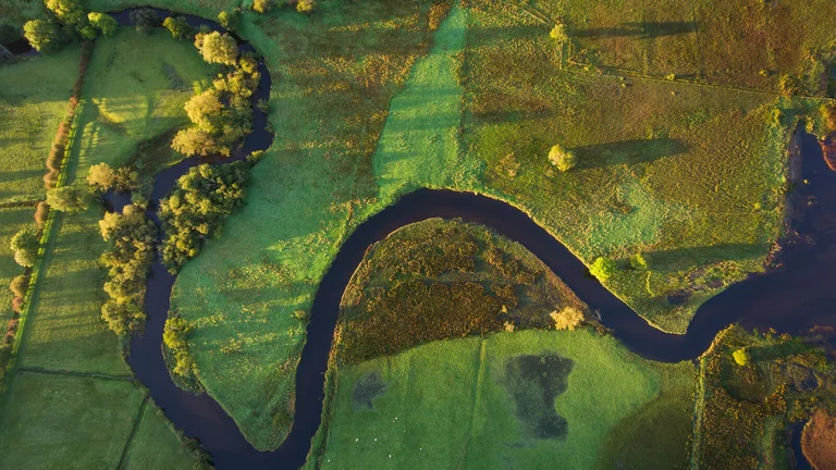 An arial view of the river Shannon meandering through green landscape.