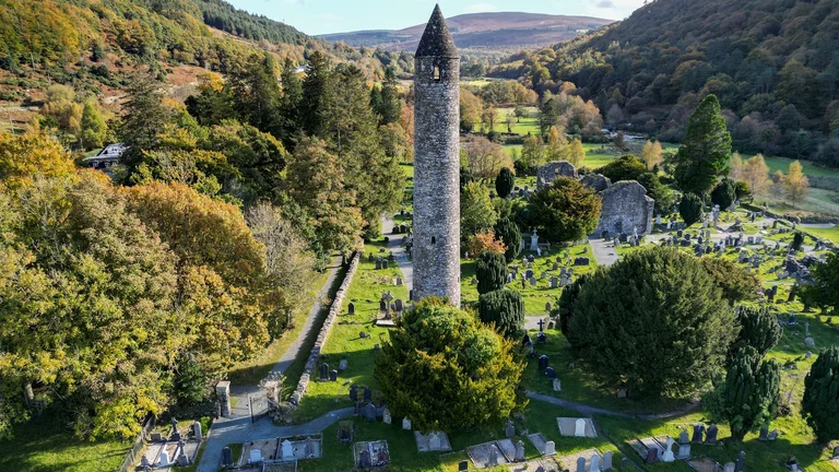 A round tower in a cemetery