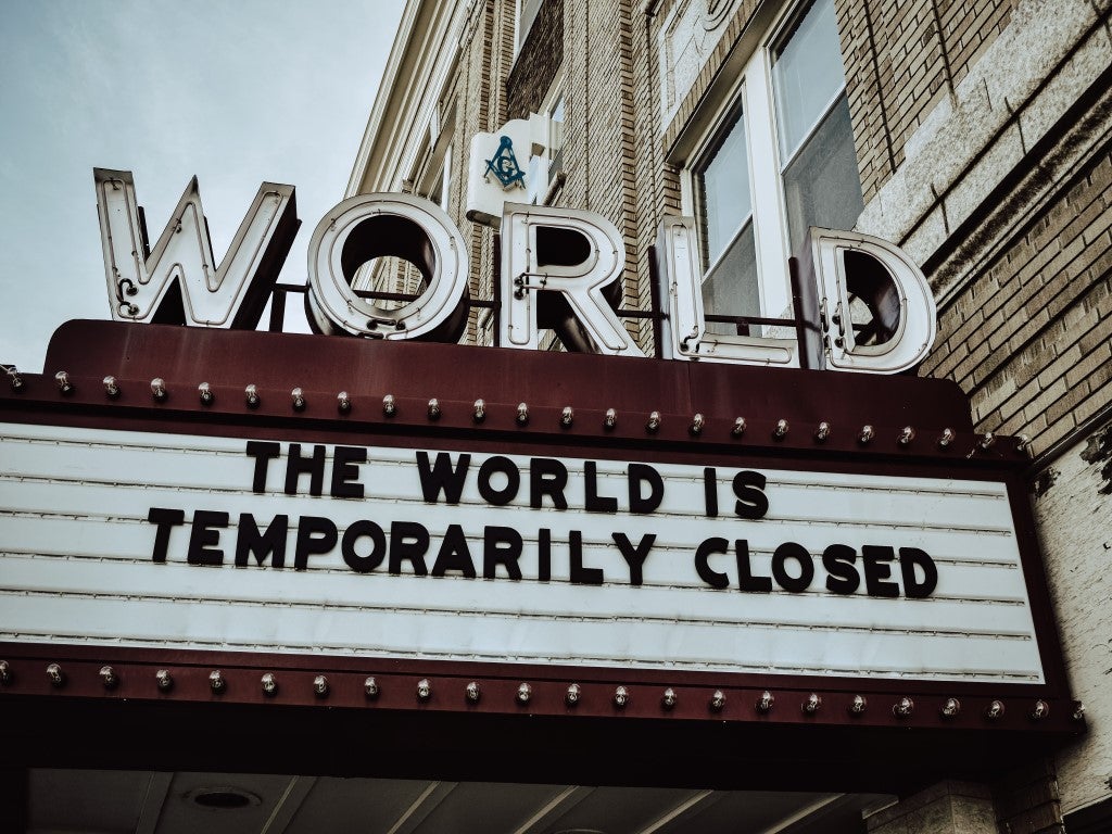 Sign saying world is closed